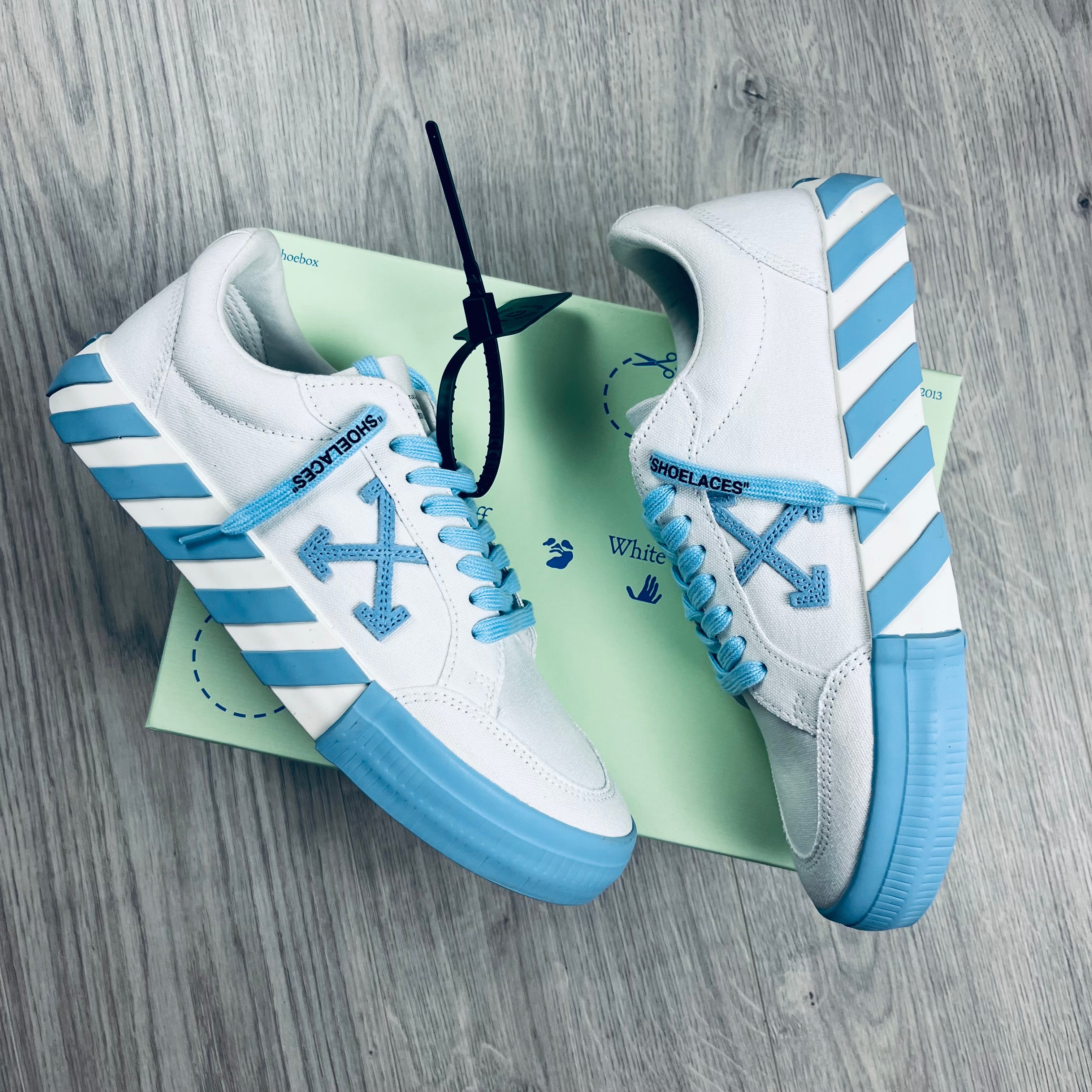 Off-White Canvas Sneakers