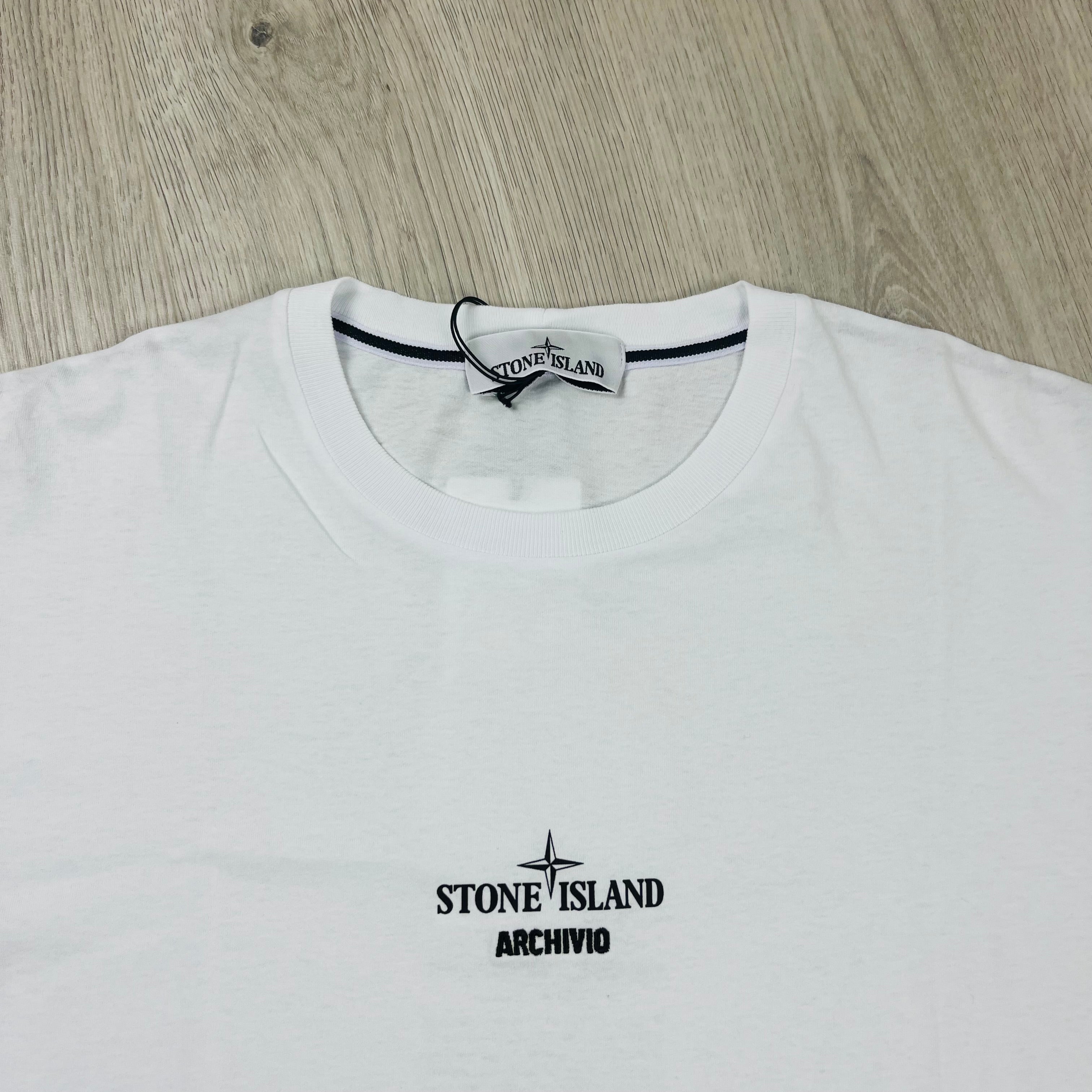 Men's Stone Island Archivio T-Shirt in White with a centrally printed compass logo. On sale at Open Attire.