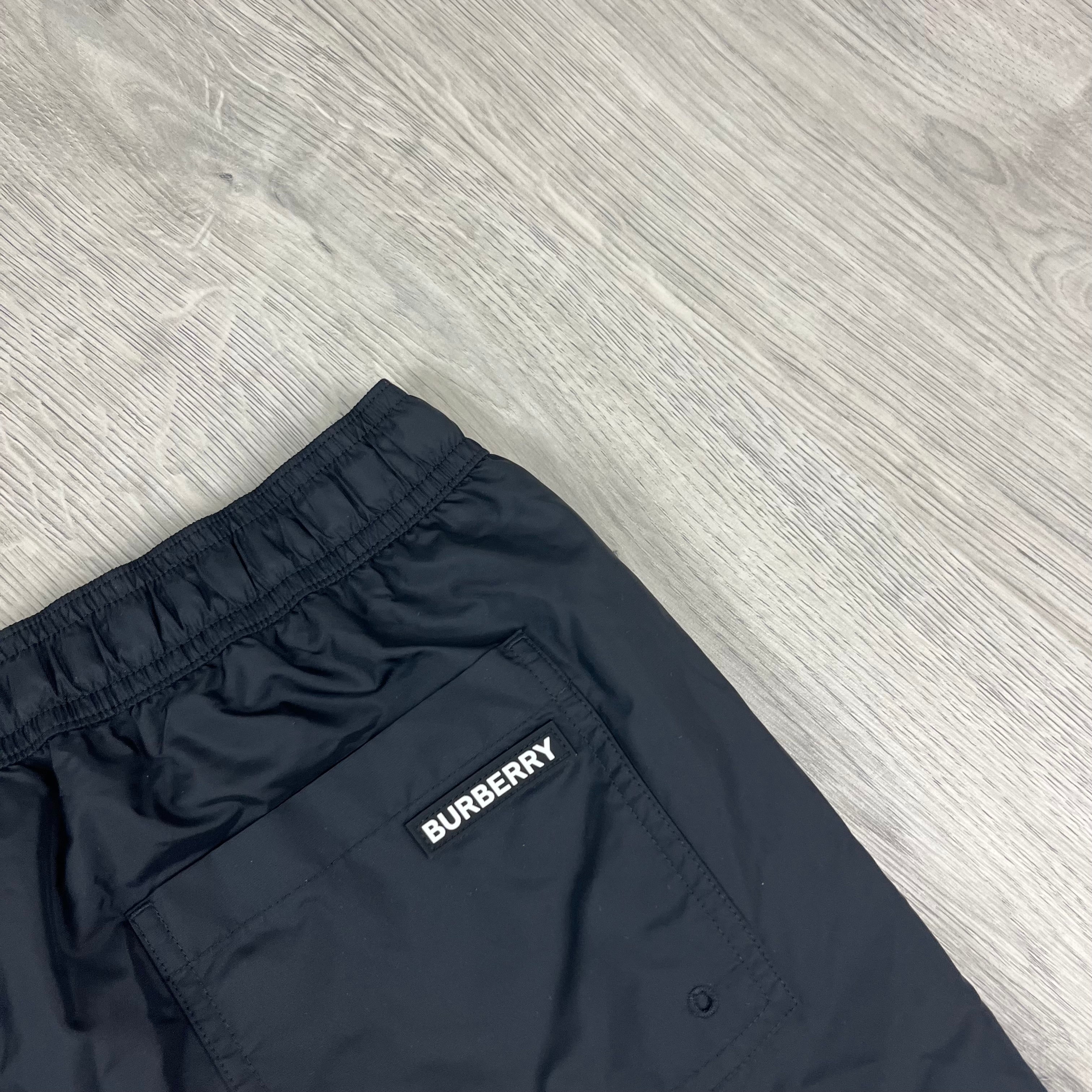 Burberry 'Martin' Swim Shorts in Black. On sale at Open Attire.