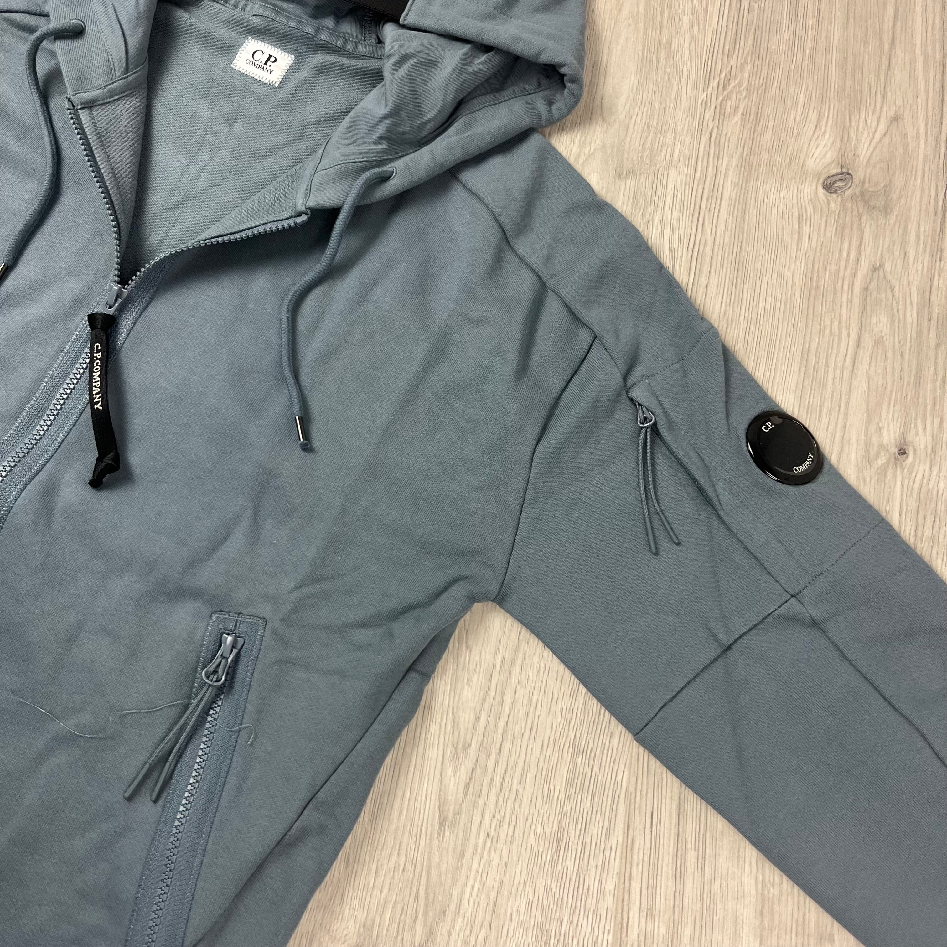 CP Company Diagonal Raised Fleece Zipped Hoodie in Stormy Weather. On Sale at Open Attire.