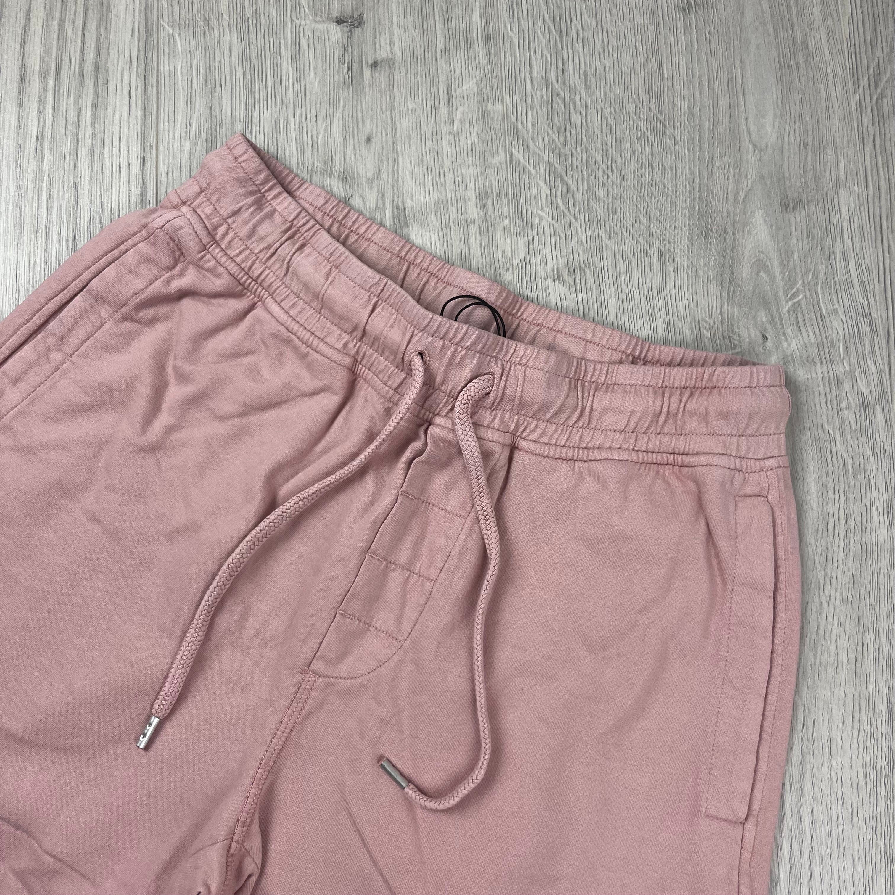 CP Company Light Fleece Jersey Shorts in Misty Rose. On sale at Open Attire.
