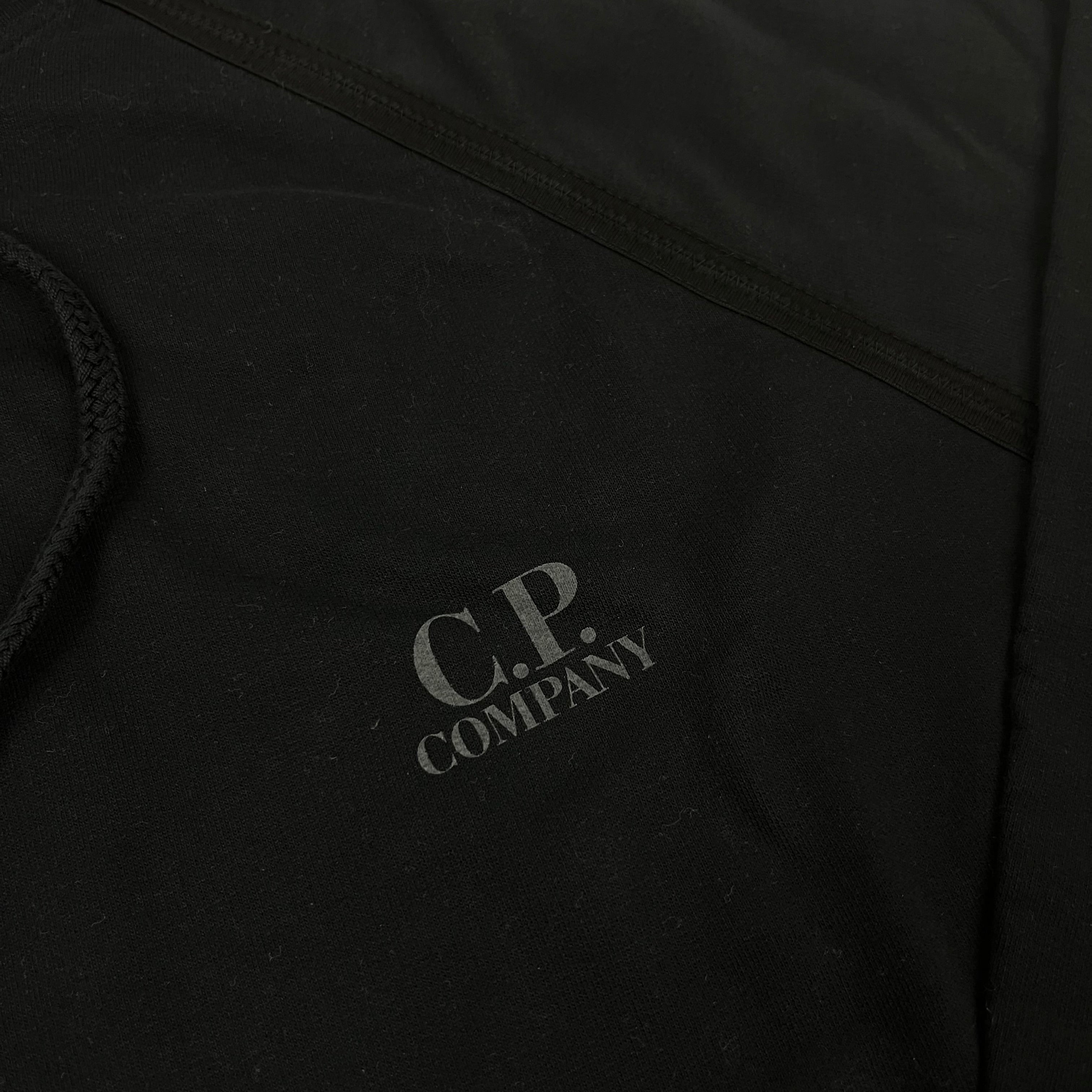 CP Company Light Fleece Hoodie in Black. On sale at Open Attire.
