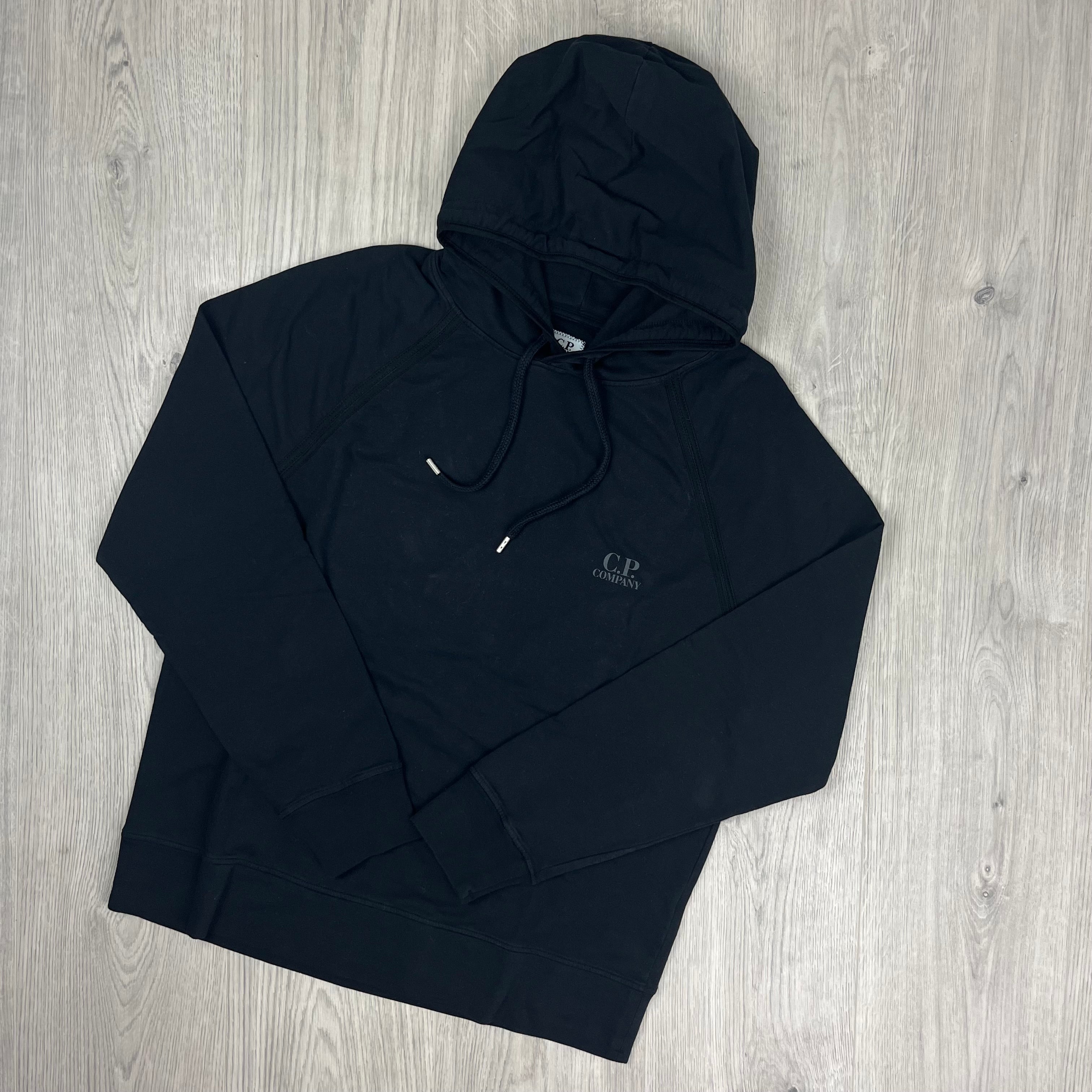 CP Company Light Fleece Hoodie in Black. On sale at Open Attire.