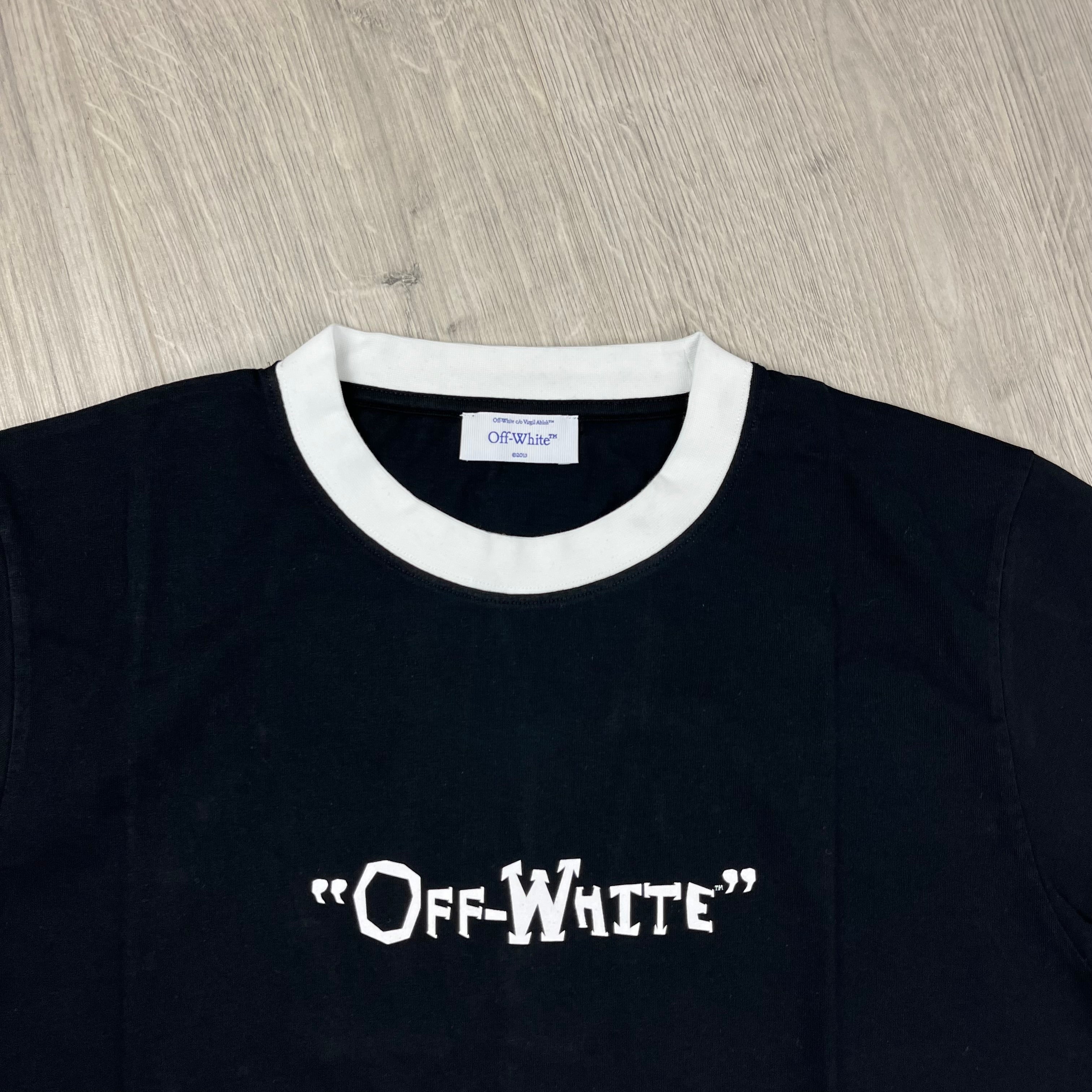 Off-White c/o Virgil Abloh Quote T-Shirt in Black. On sale at Open Attire.