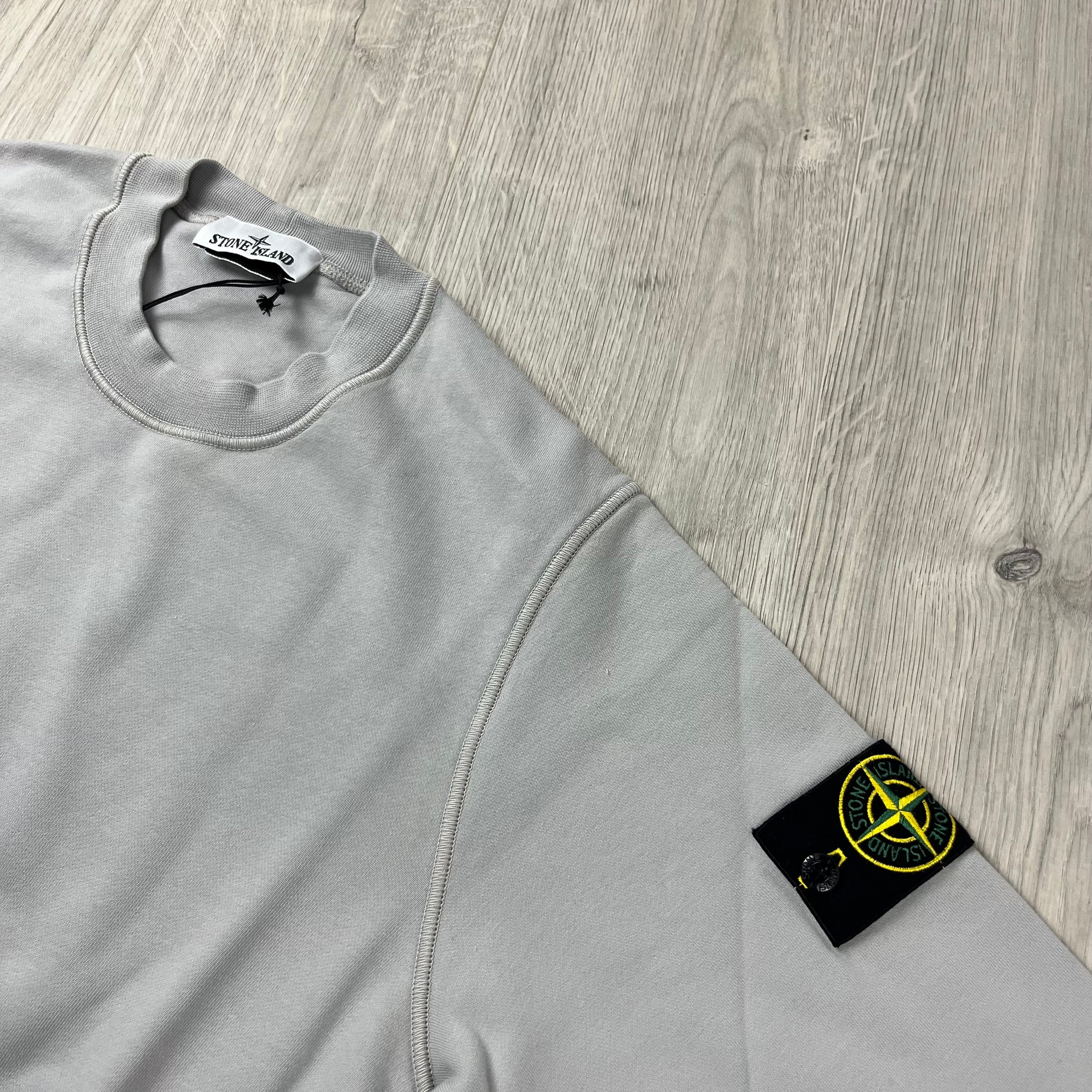 Stone Island Dyed Cotton Sweatshirt in Pearl Grey. On sale at Open Attire.