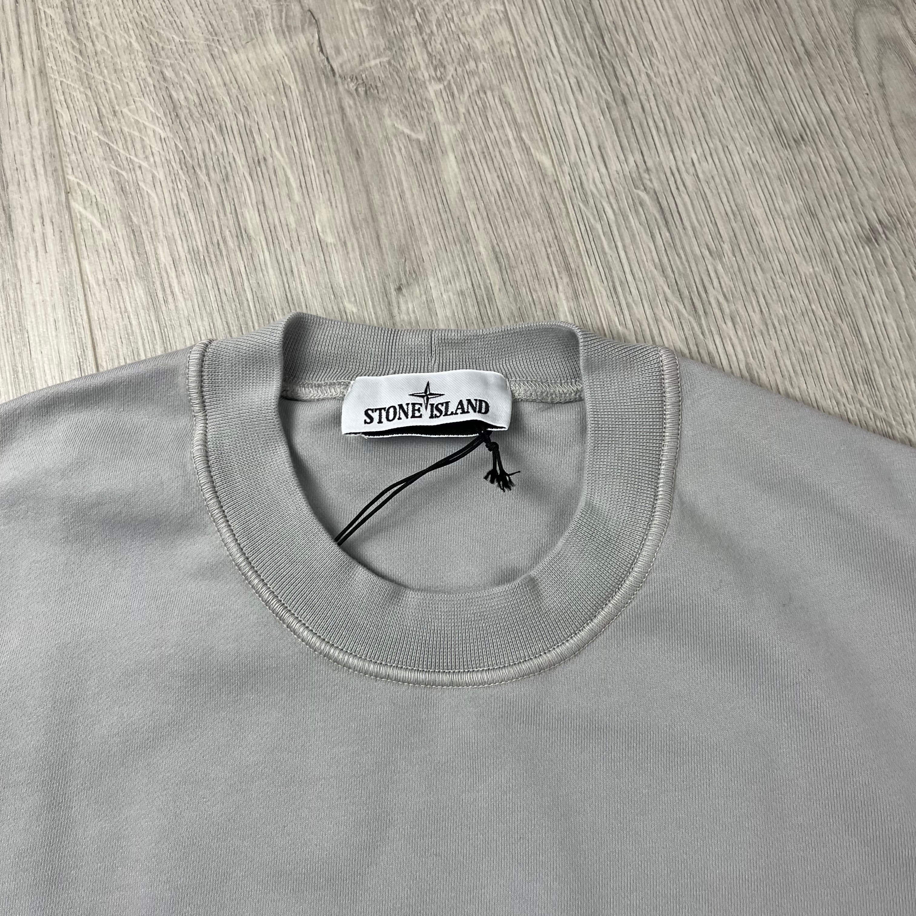 Stone Island Dyed Cotton Sweatshirt in Pearl Grey. On sale at Open Attire.