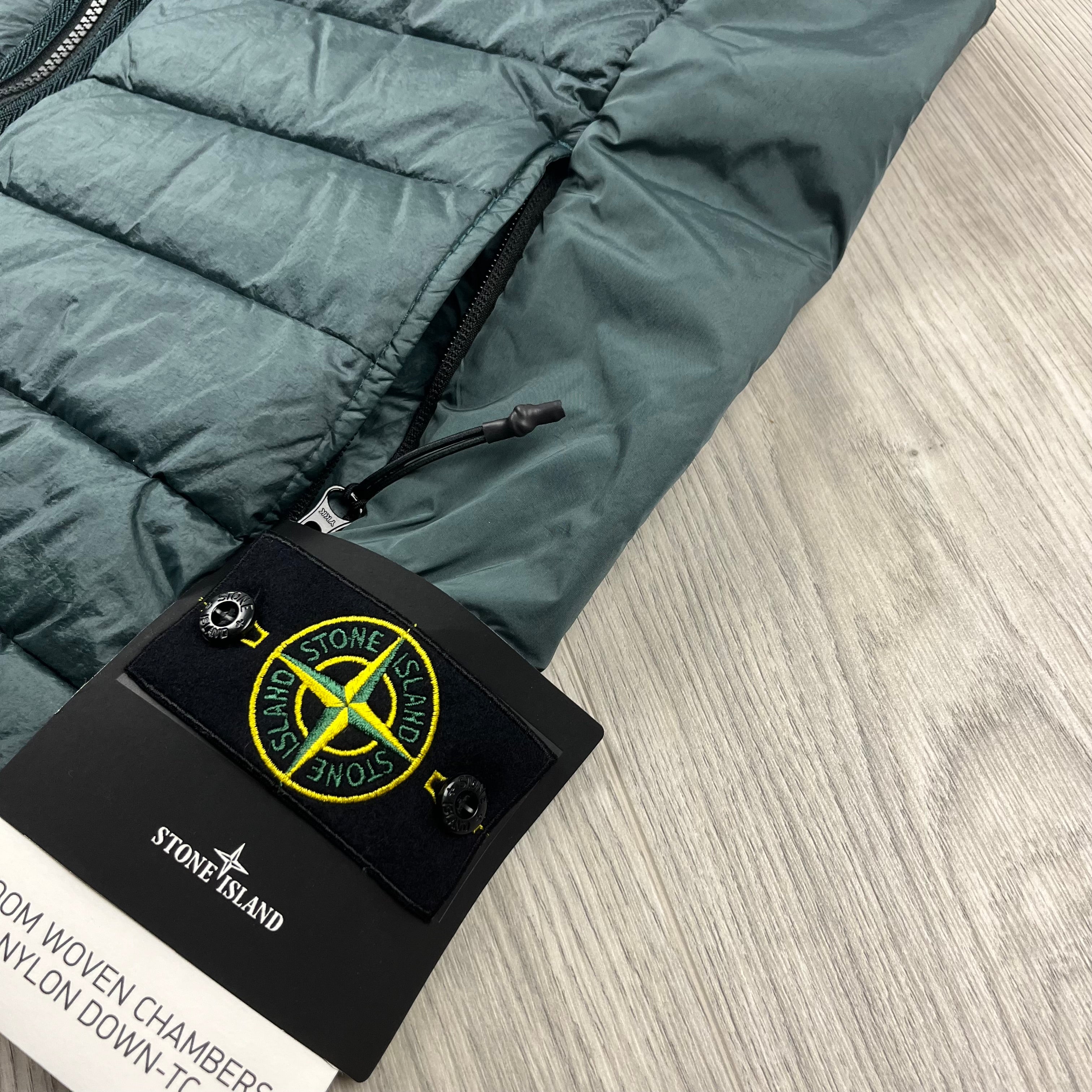 Stone Island Loom Woven Down Gilet in Bottle Green. On sale at Open Attire.