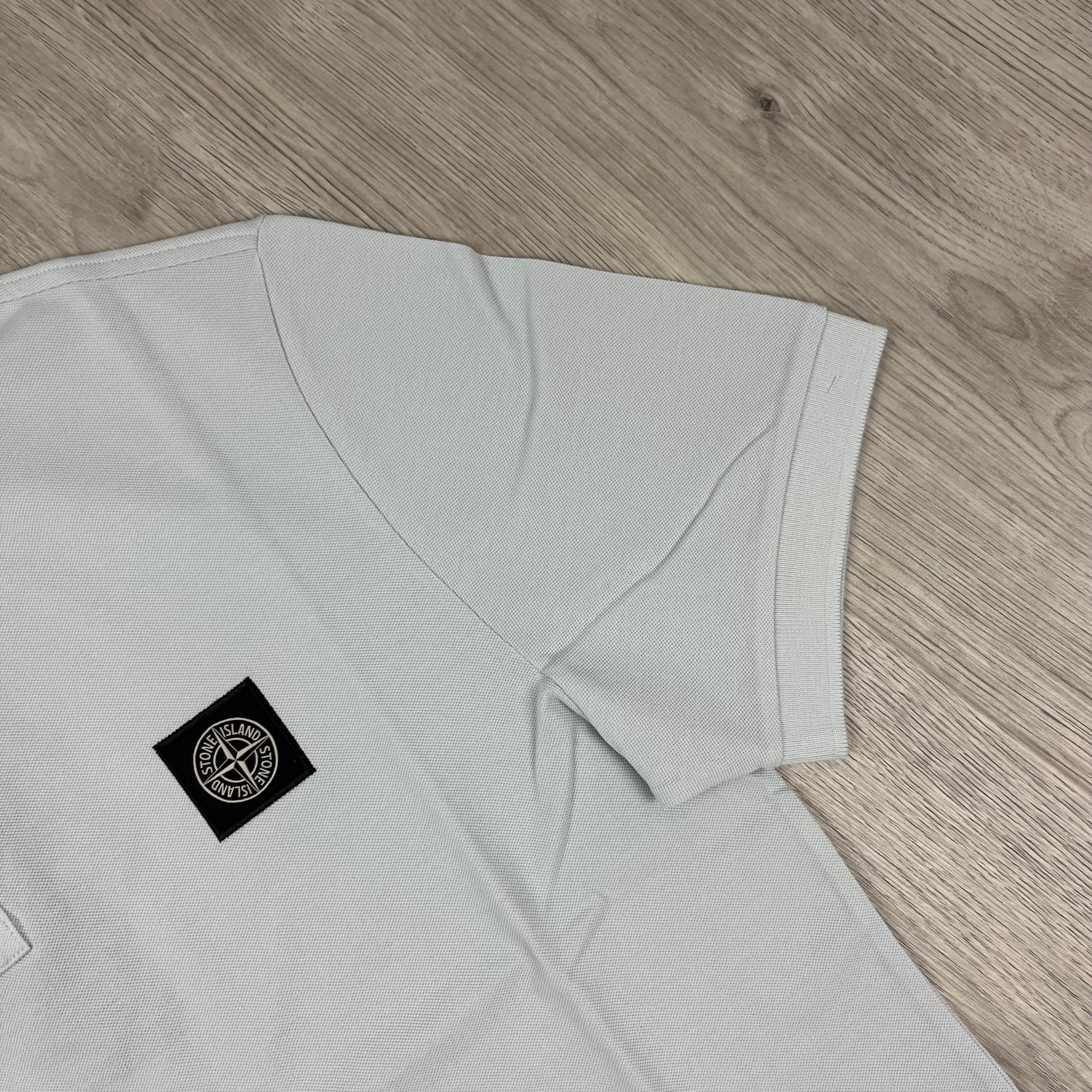 Stone Island Piqué Patch Polo Shirt in Sky Blue. On sale at Open Attire.