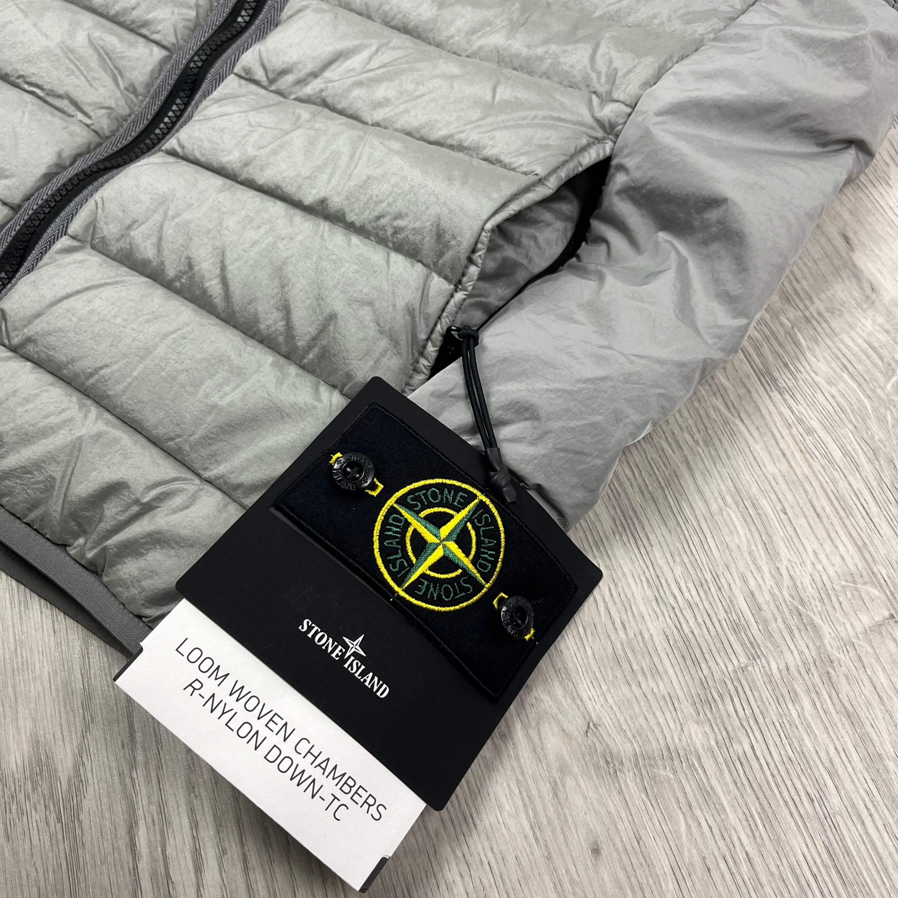 Stone Island down gilet in Grey. On sale at Open Attire.