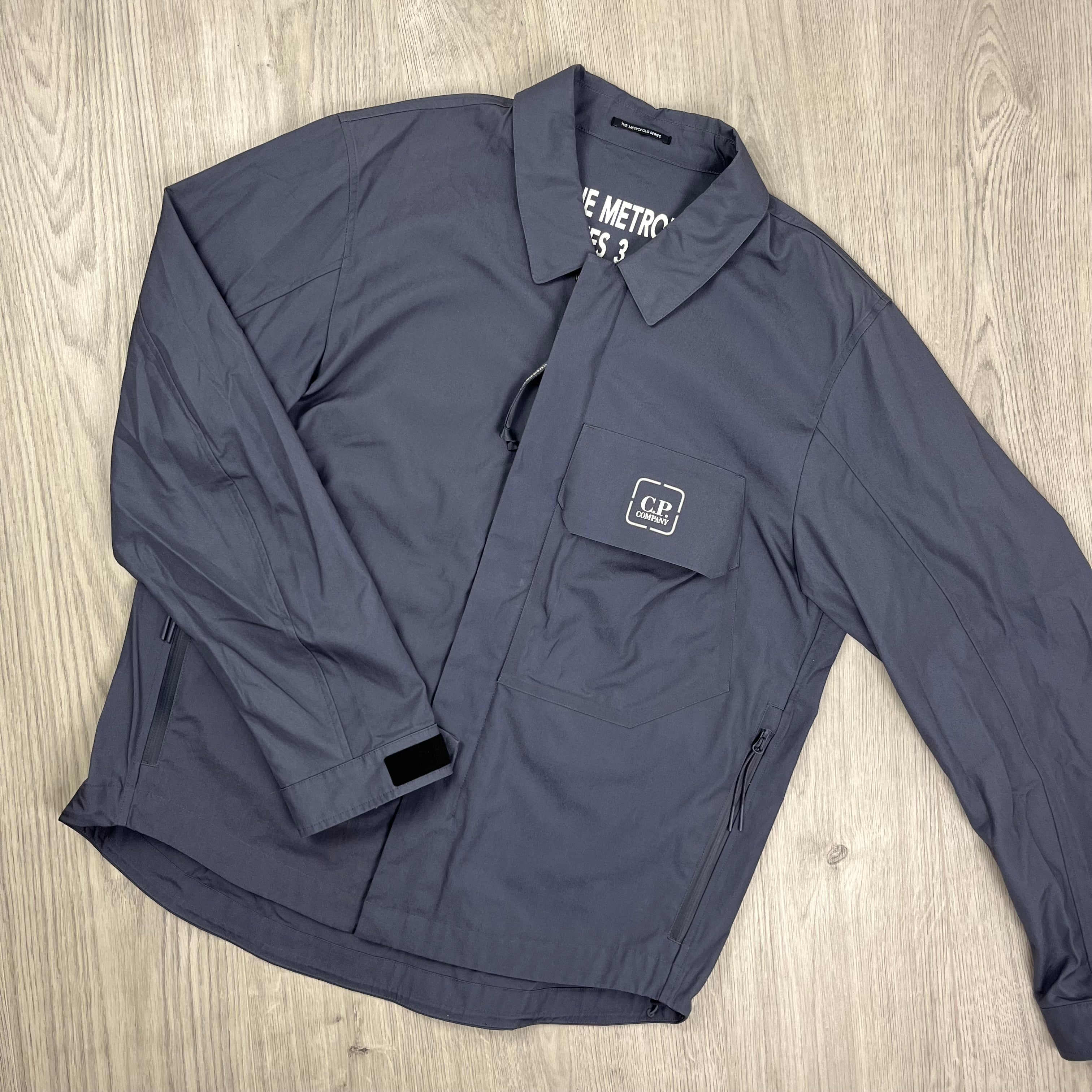 CP Company Metropolis Harrington Jacket in Ombre Blue. On sale at Open Attire.