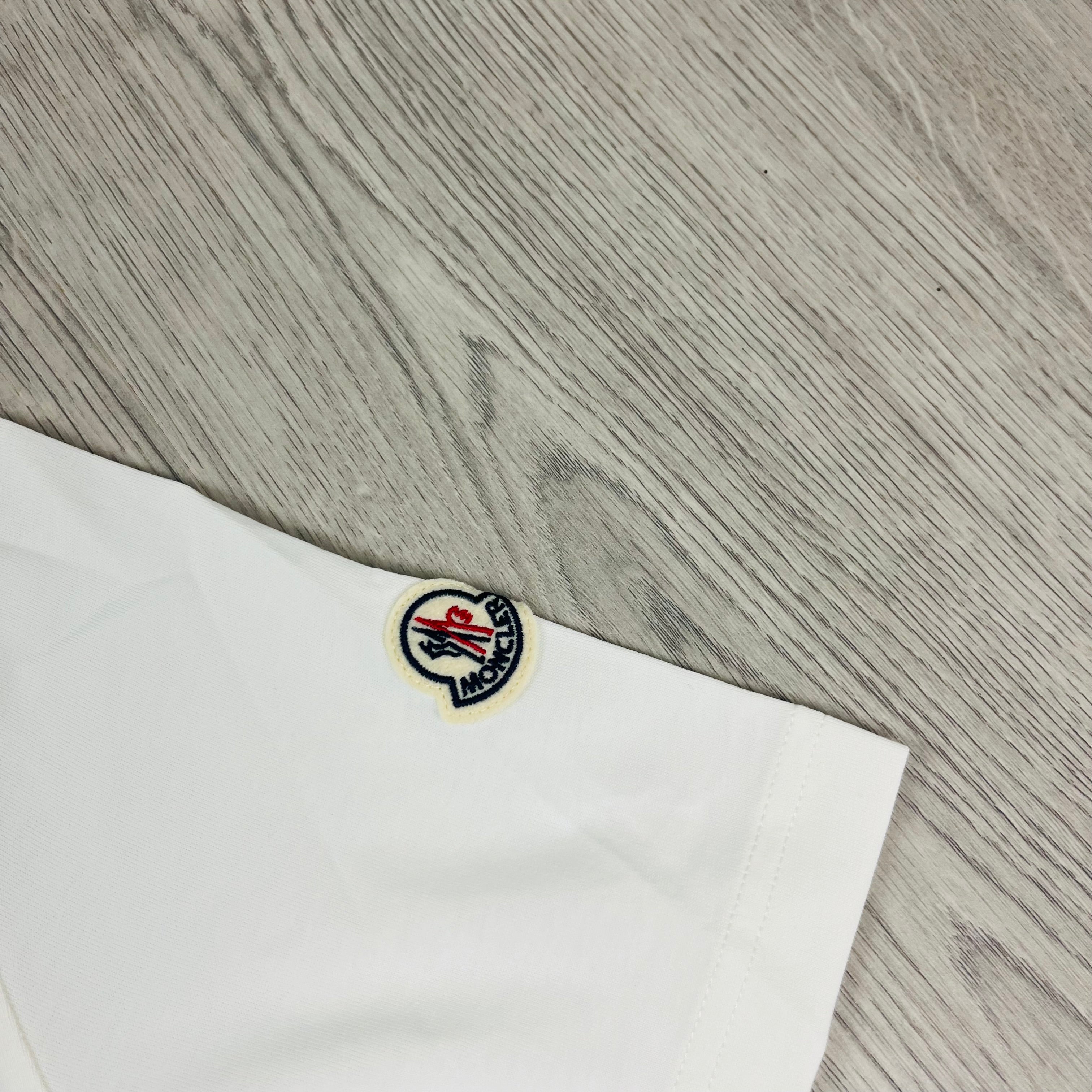 Moncler Logo T-shirt in White. On sale at Open Attire.