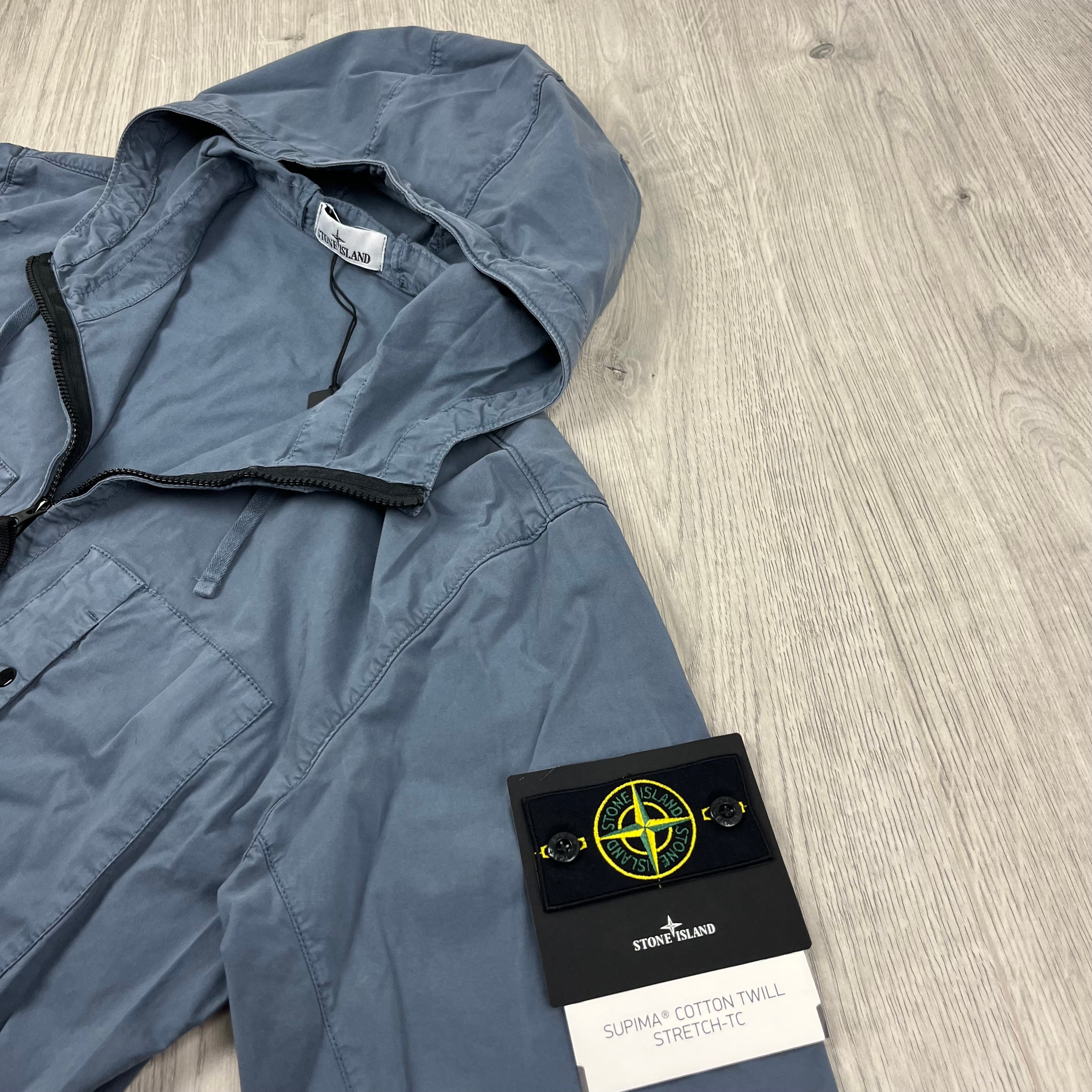Men's Stone Island Supima Hooded Overshirt in Avio Blue. On sale at Open Attire.