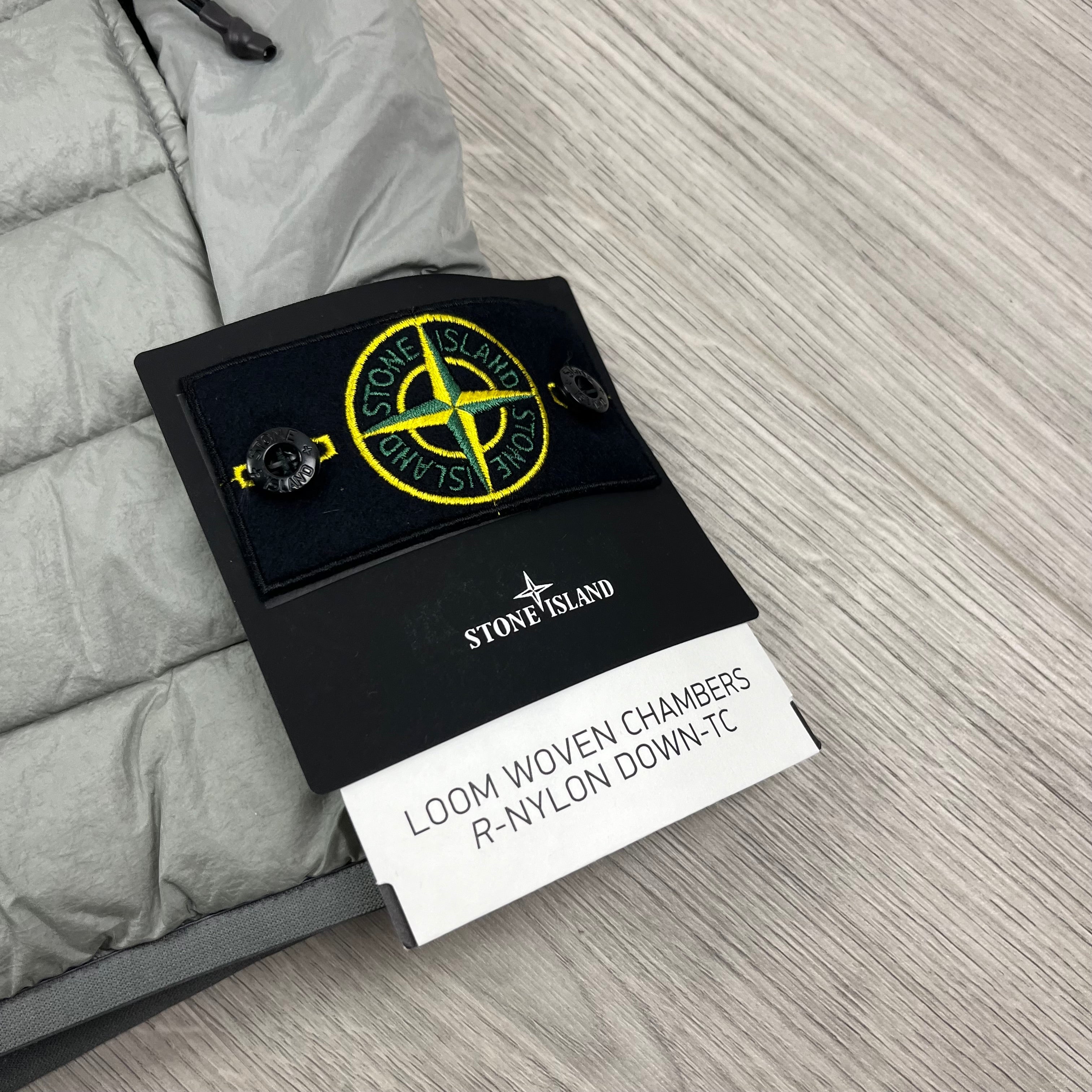 Stone Island down gilet in Grey. On sale at Open Attire.