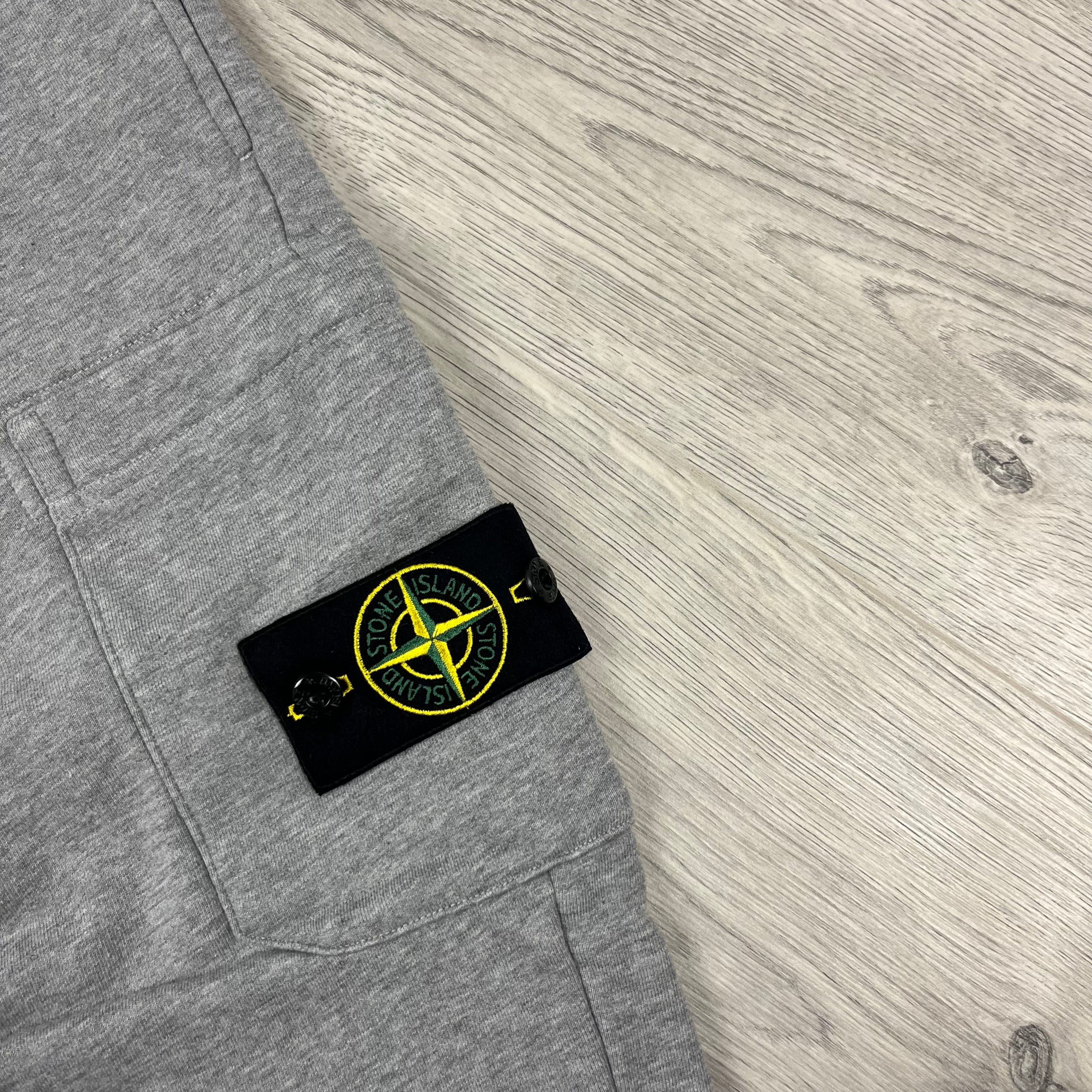 Stone Island Tapered Sweatpants in Dust Grey. On sale at Open Attire.