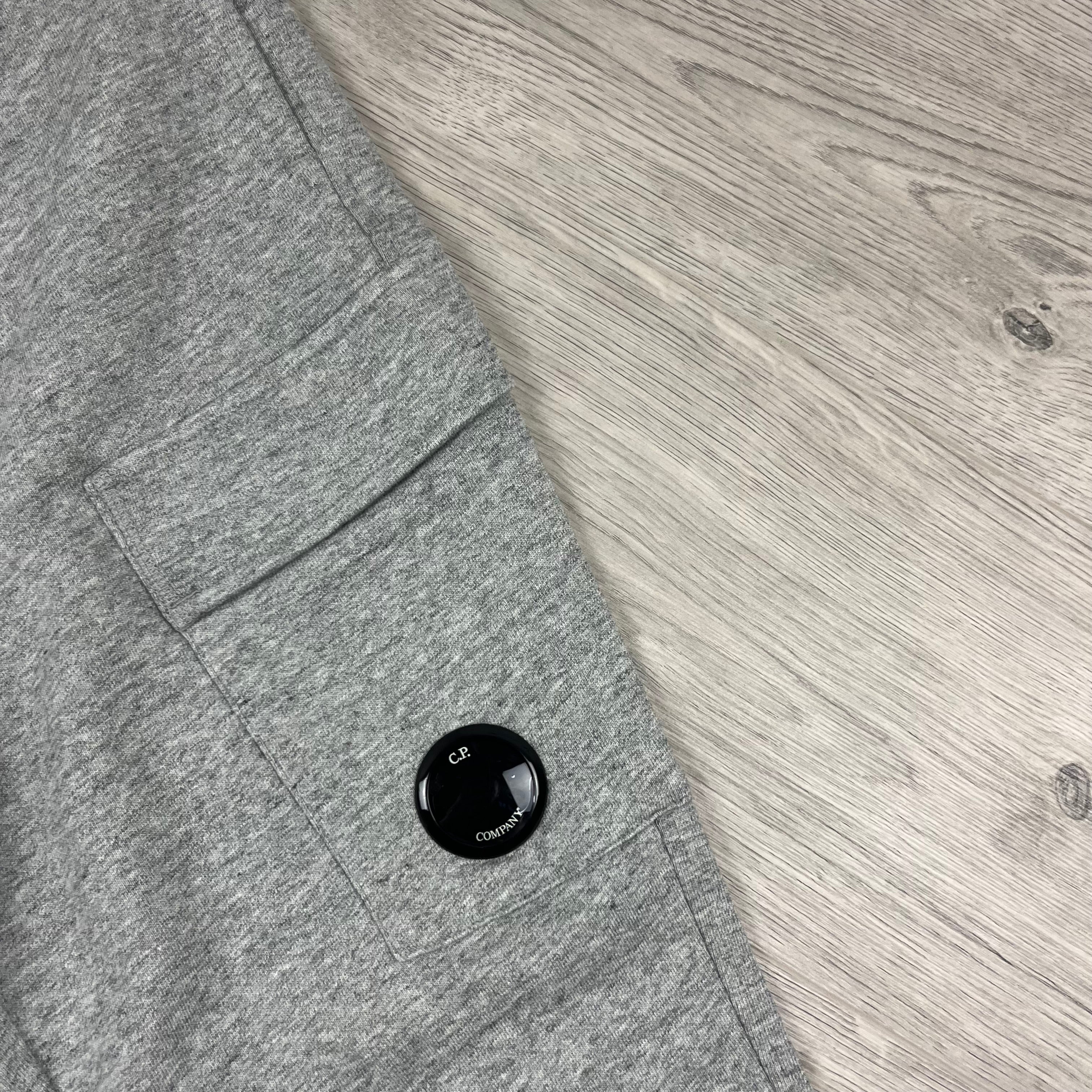 CP Company Raised Fleece Cargo Sweatpants in Greystone Melange. On sale at Open Attire.