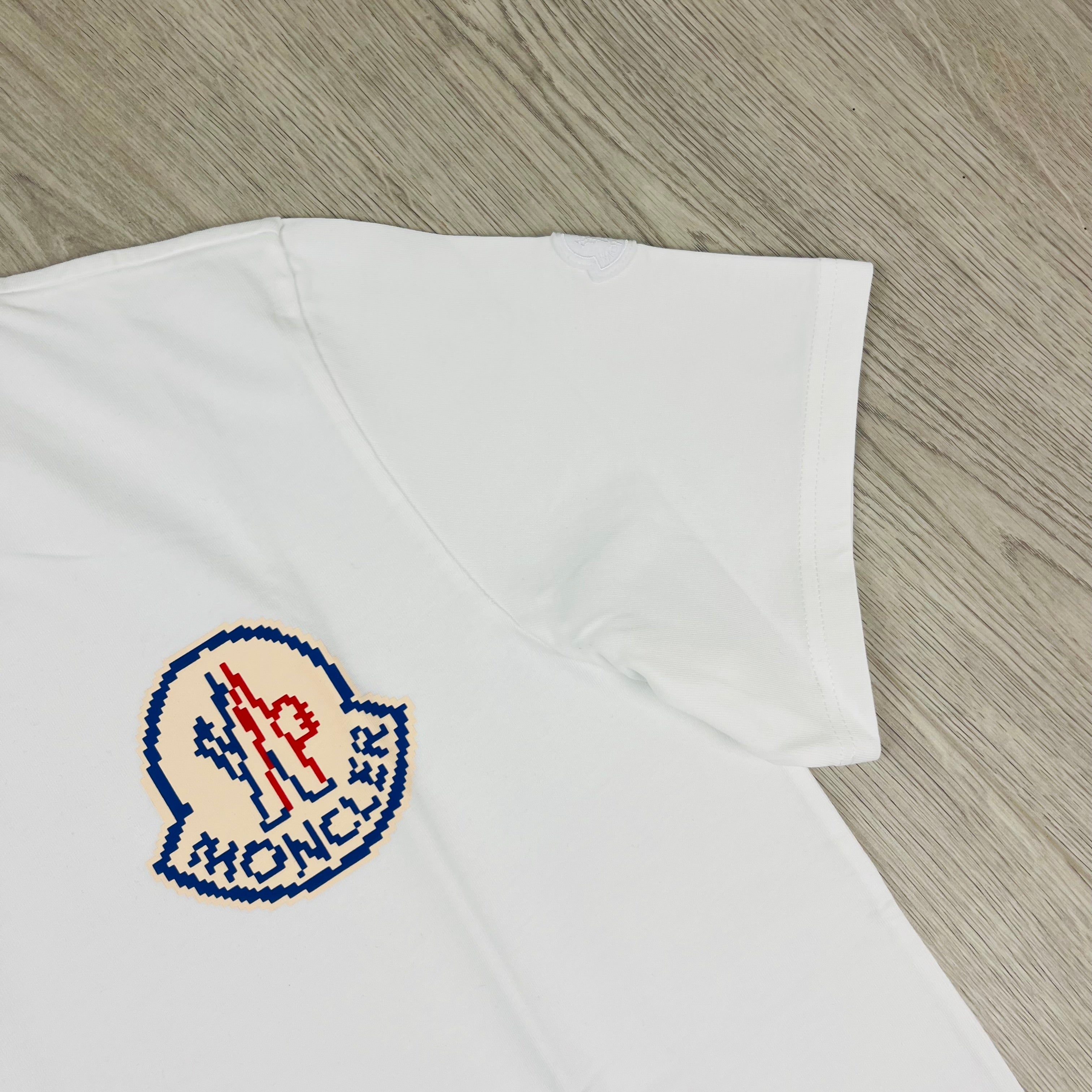 Moncler Pixelated T-shirt in White. On sale at Open Attire.