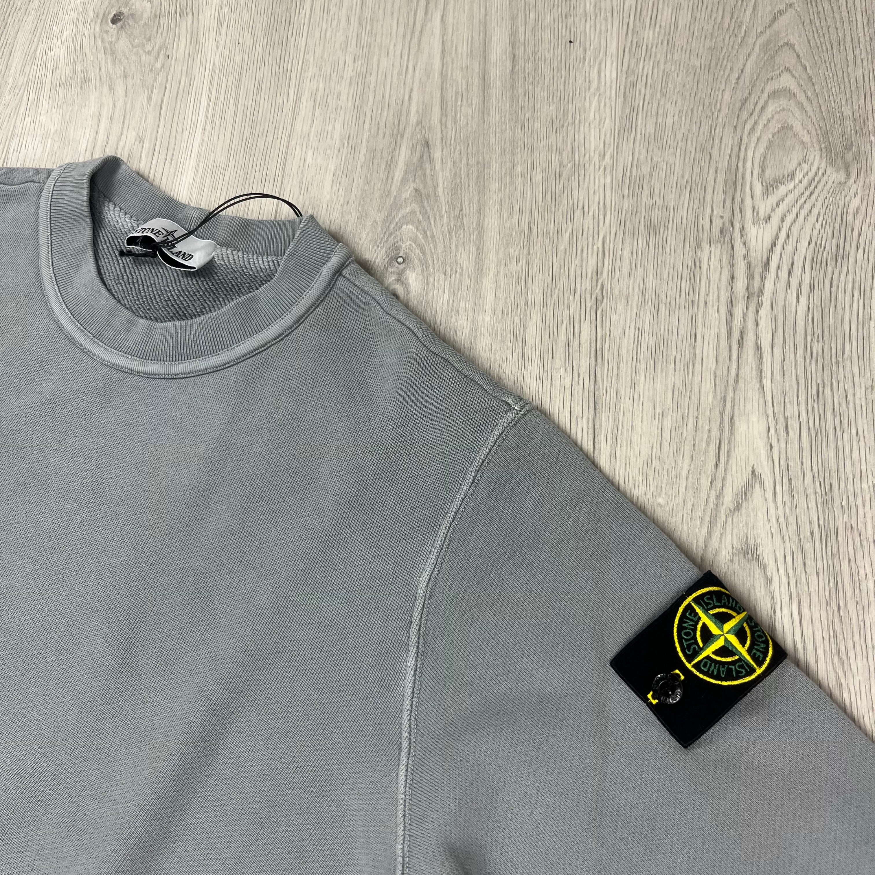 Stone Island crewneck sweatshirt in Green Grey. On sale at Open Attire.