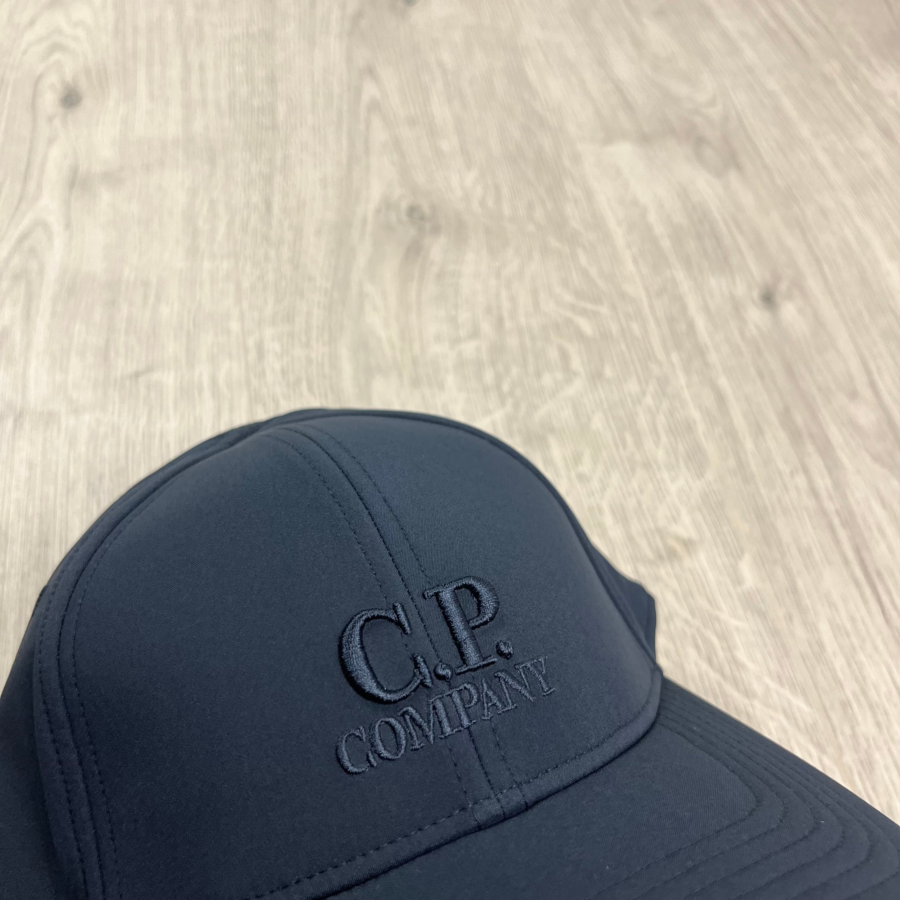 CP Company Shell-R Baseball Cap in Total Eclipse Navy Blue. On sale at Open Attire.