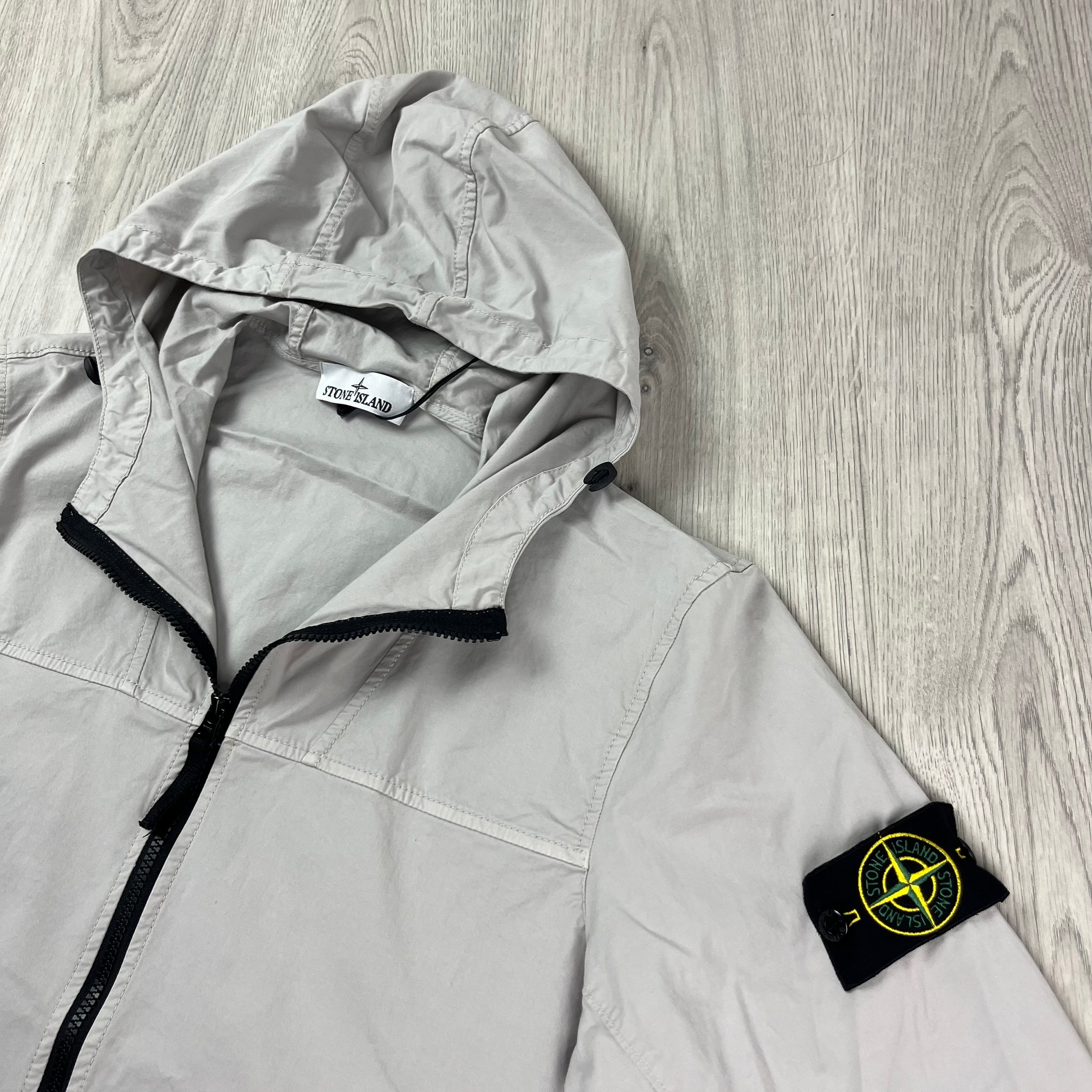 Stone Island Hooded Overshirt in Grey. On sale at Open Attire.