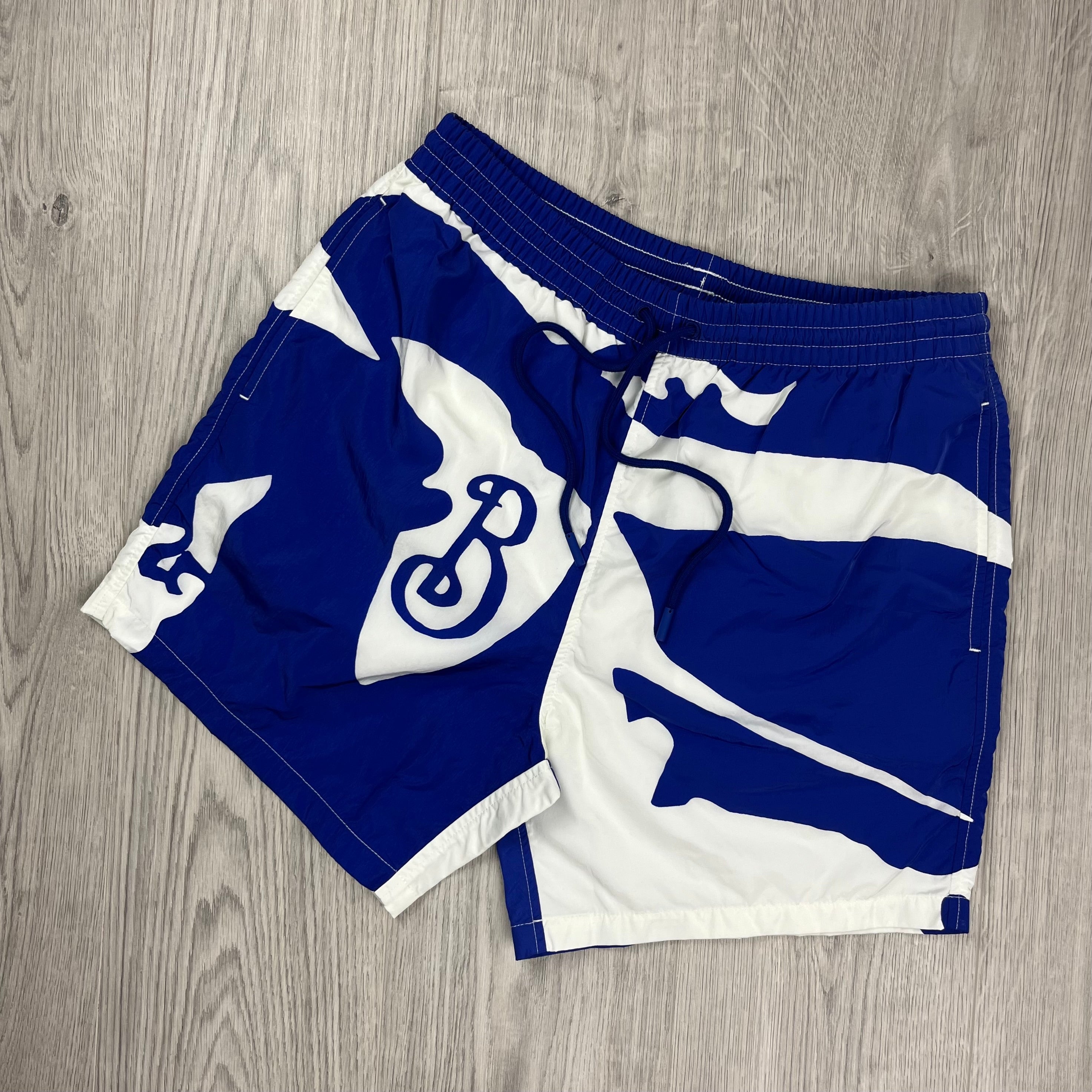 Burberry EKD Abstract Swim Shorts in Blue. On sale at Open Attire.