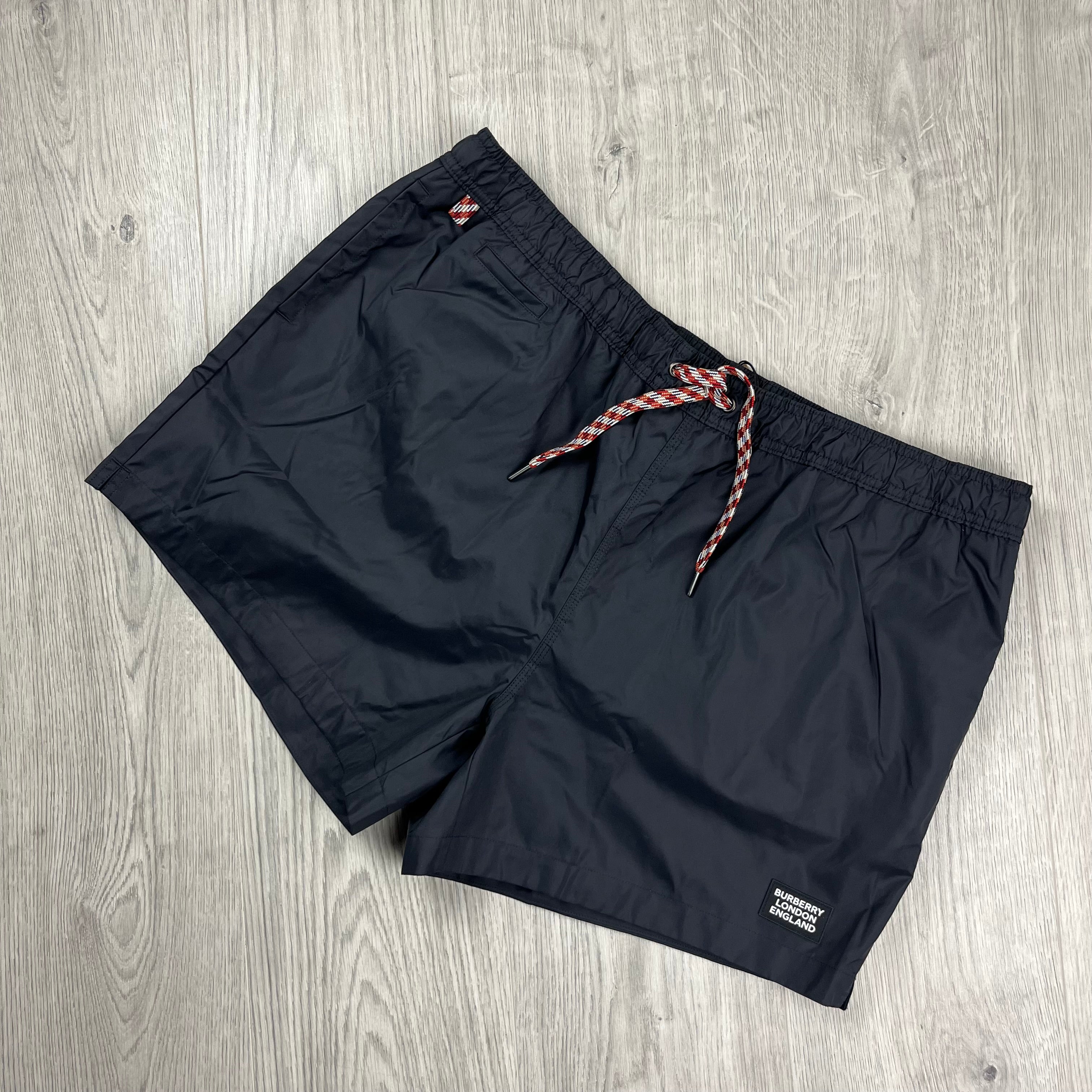 Burberry 'Greenford' Swim Shorts in Black. On sale at Open Attire.