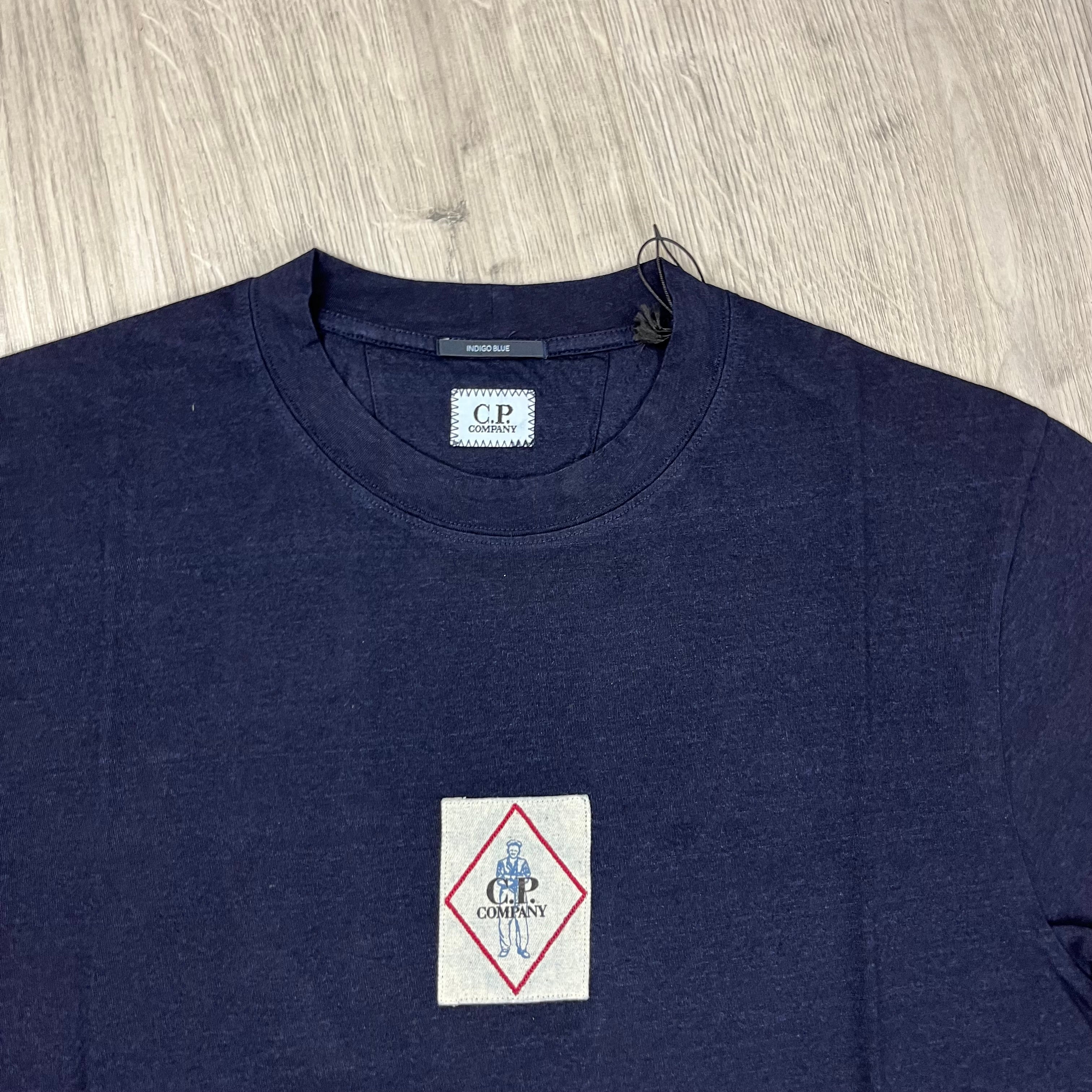 CP Company Embroidered British Sailor T-Shirt in Indigo Blue Denim. On sale at Open Attire.