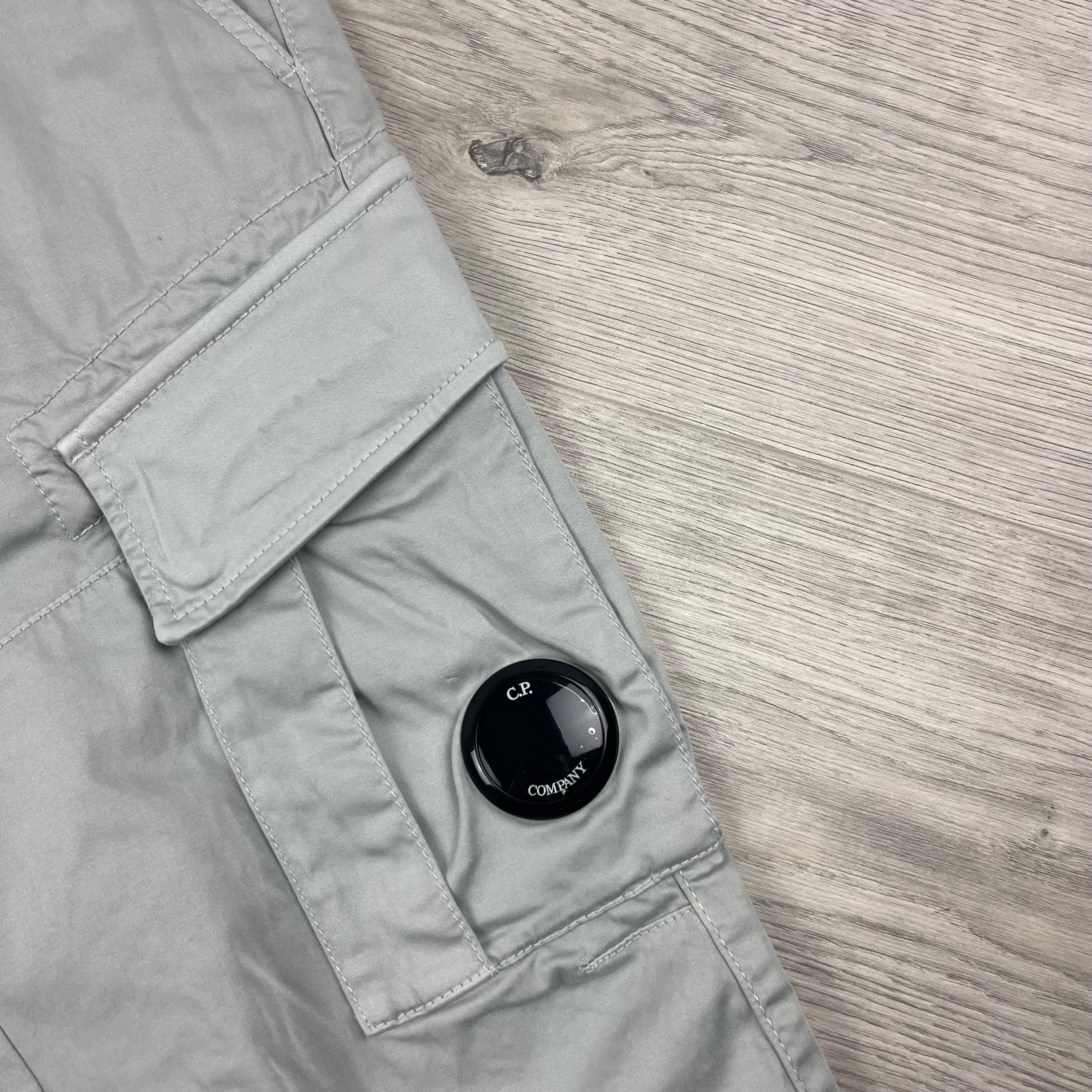 CP Company Stretch Sateen Cargo Trousers in Blue Fox. On sale at Open Attire.