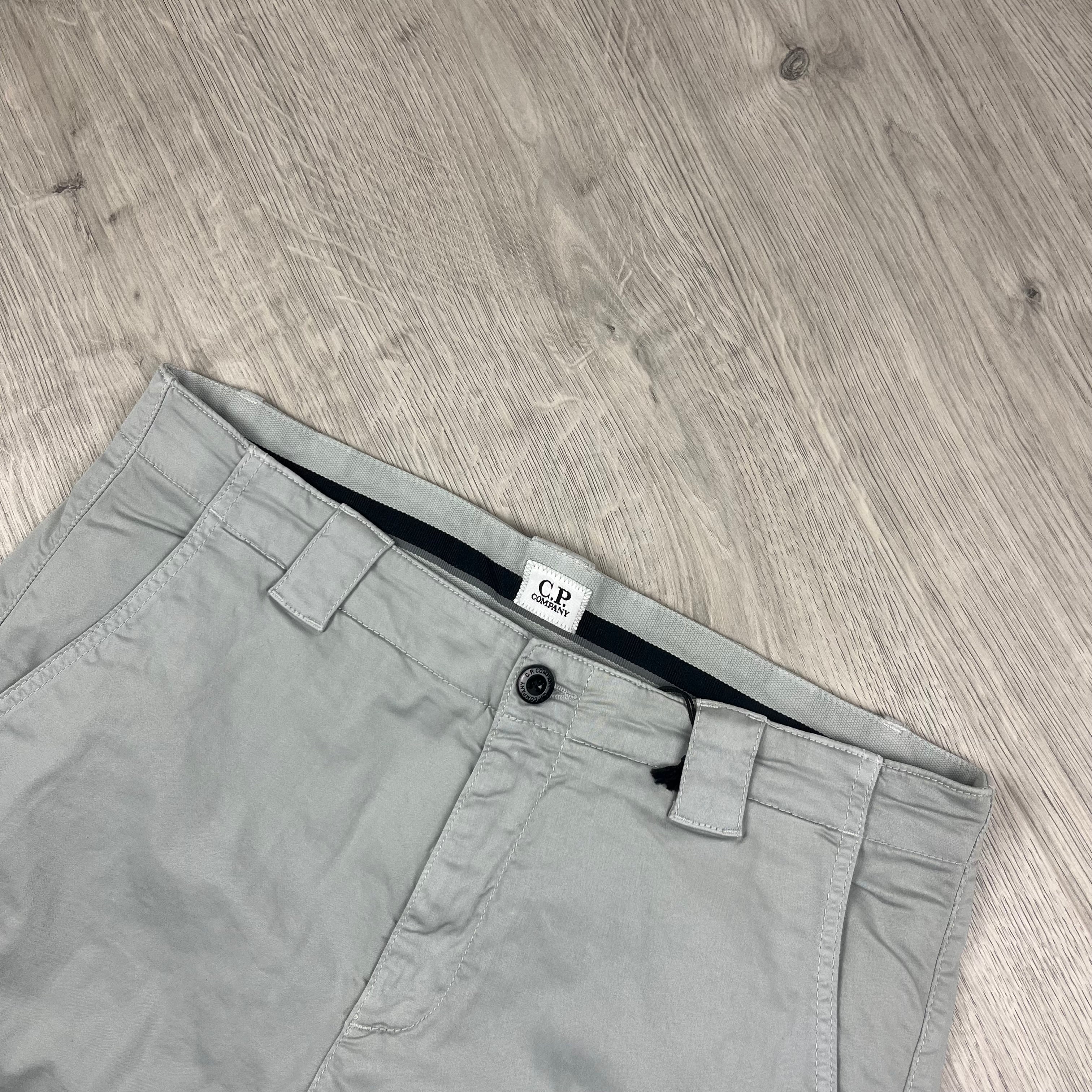 CP Company Stretch Sateen Cargo Trousers in Blue Fox. On sale at Open Attire.