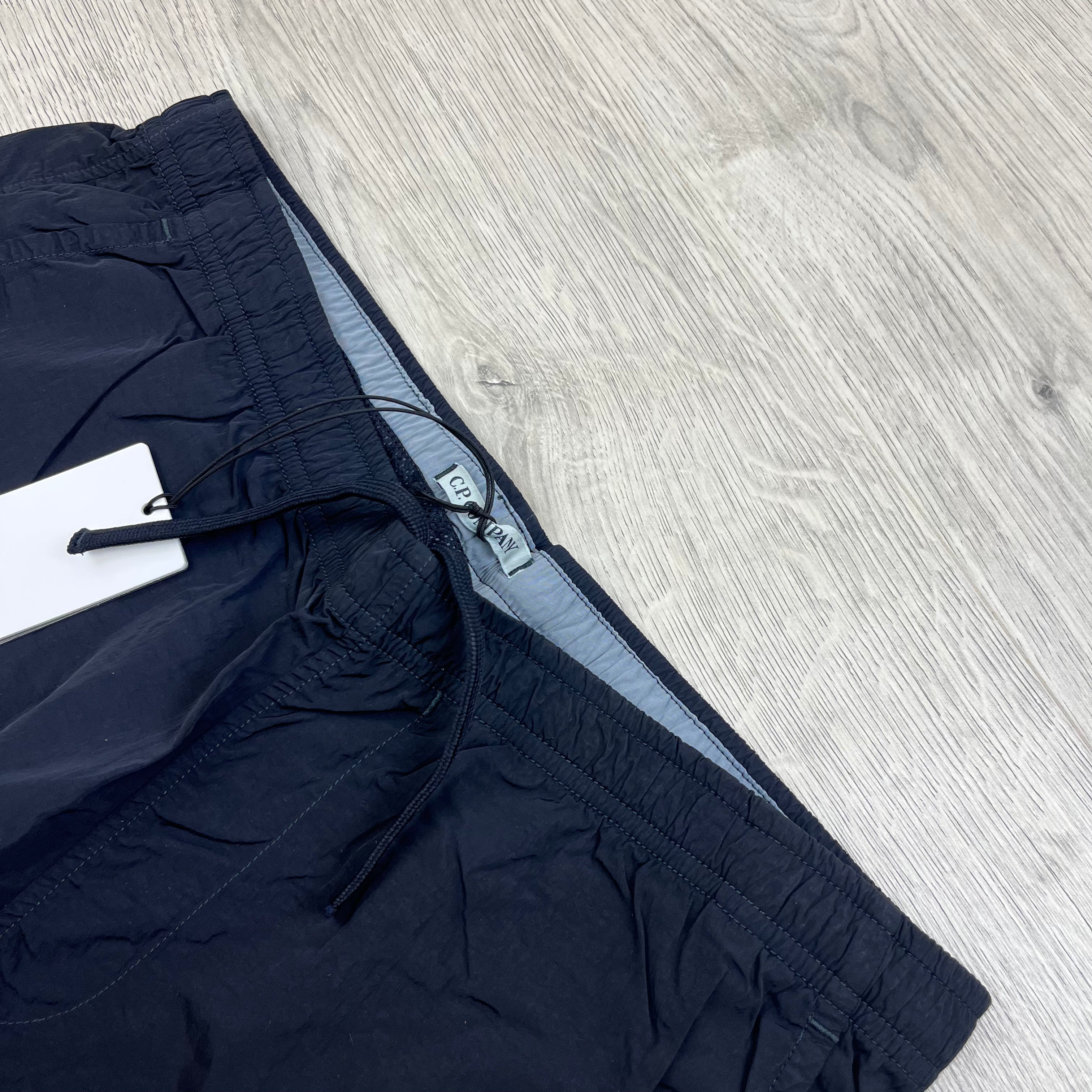 CP Company Eco Chrome-R Swim Shorts in Total Eclipse Navy Blue. On sale at Open Attire.