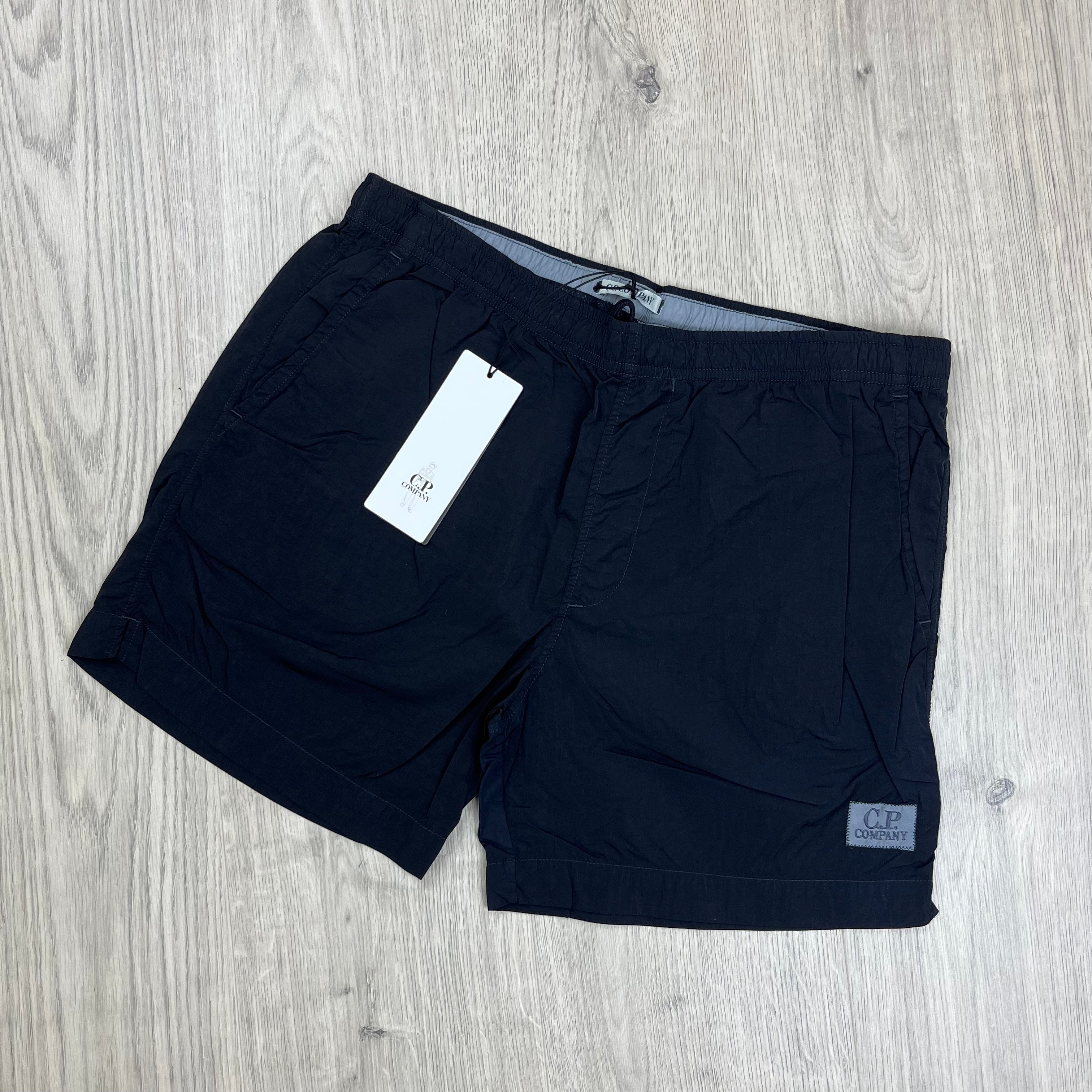 CP Company Eco Chrome-R Swim Shorts in Total Eclipse Navy Blue. On sale at Open Attire.