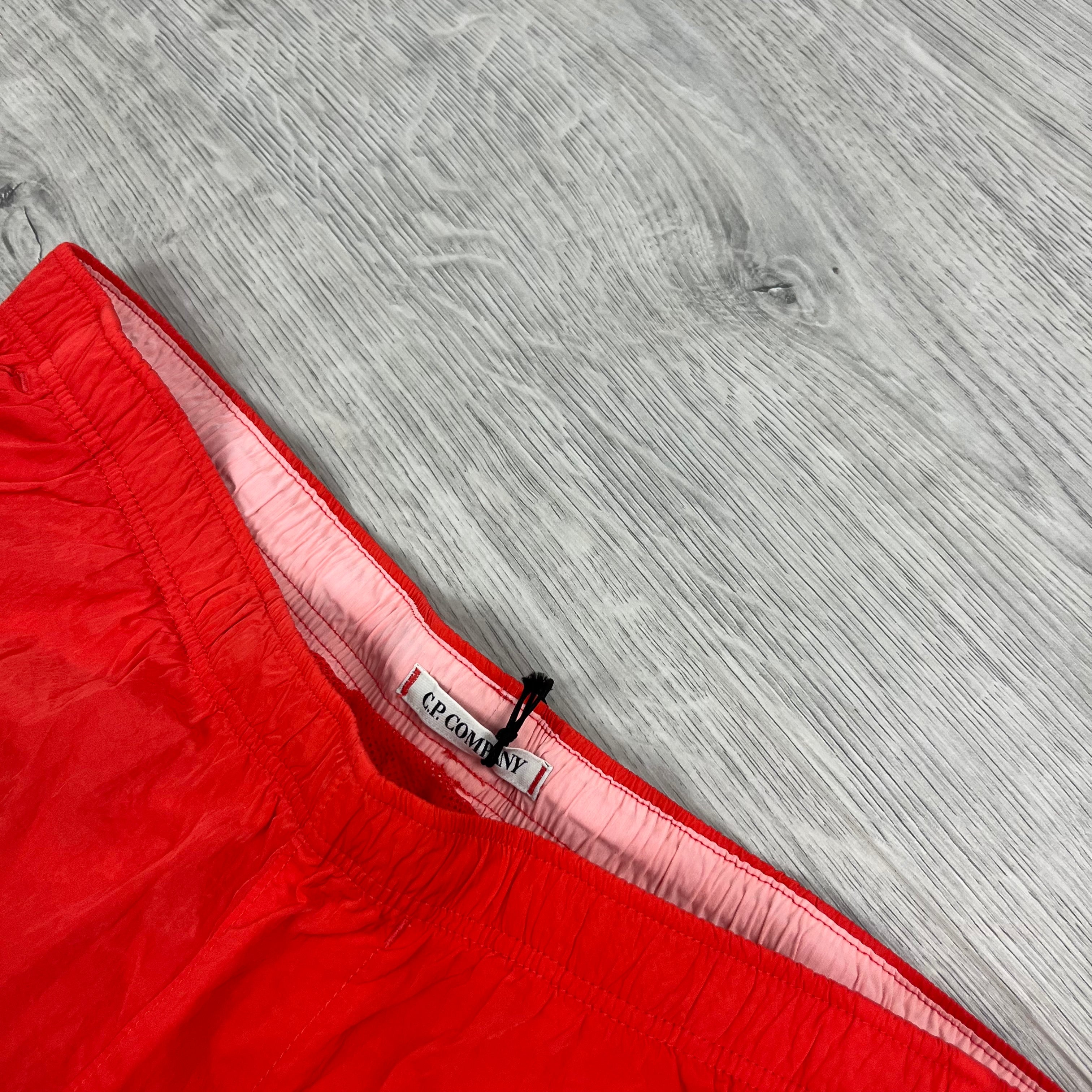 CP Company Chrome-R Swim Shorts in Poinciana. On sale at Open Attire.