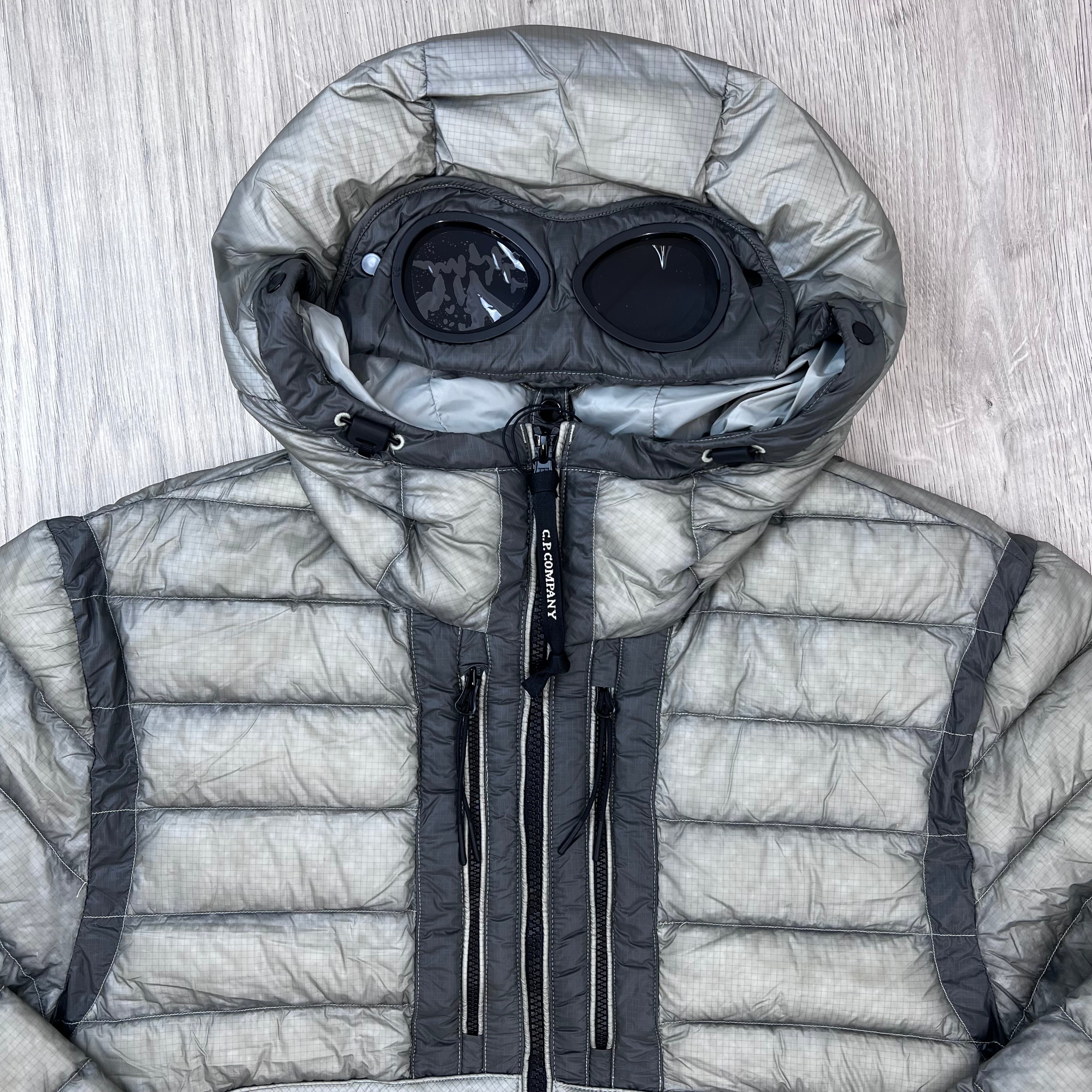 A close up view of the hood and chest pockets on the CP Company D.D. Shell Goggle Jacket in Flint Grey.