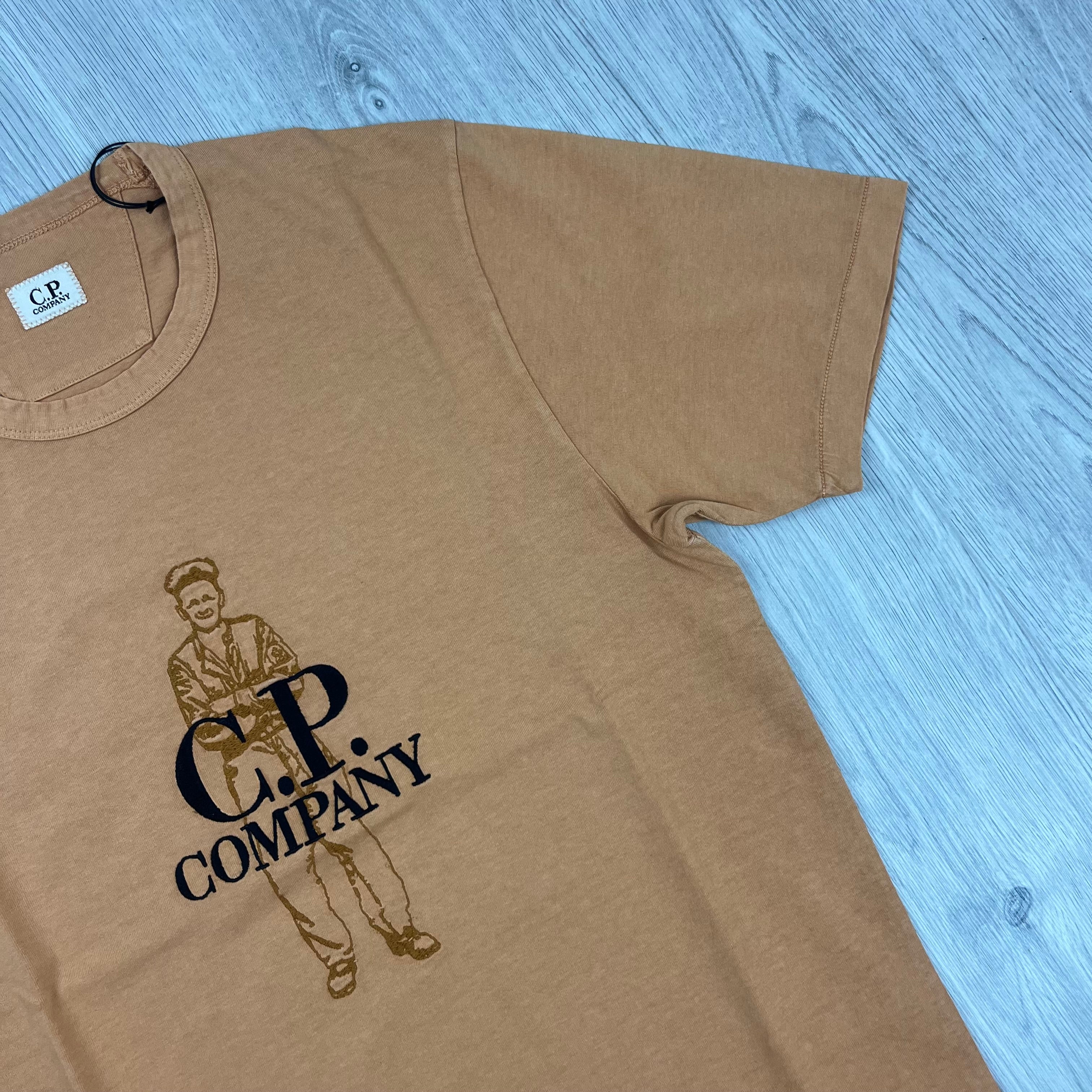 CP Company 1020 Embroidered Sailor T-Shirt in Pastry Shell. On sale at Open Attire.