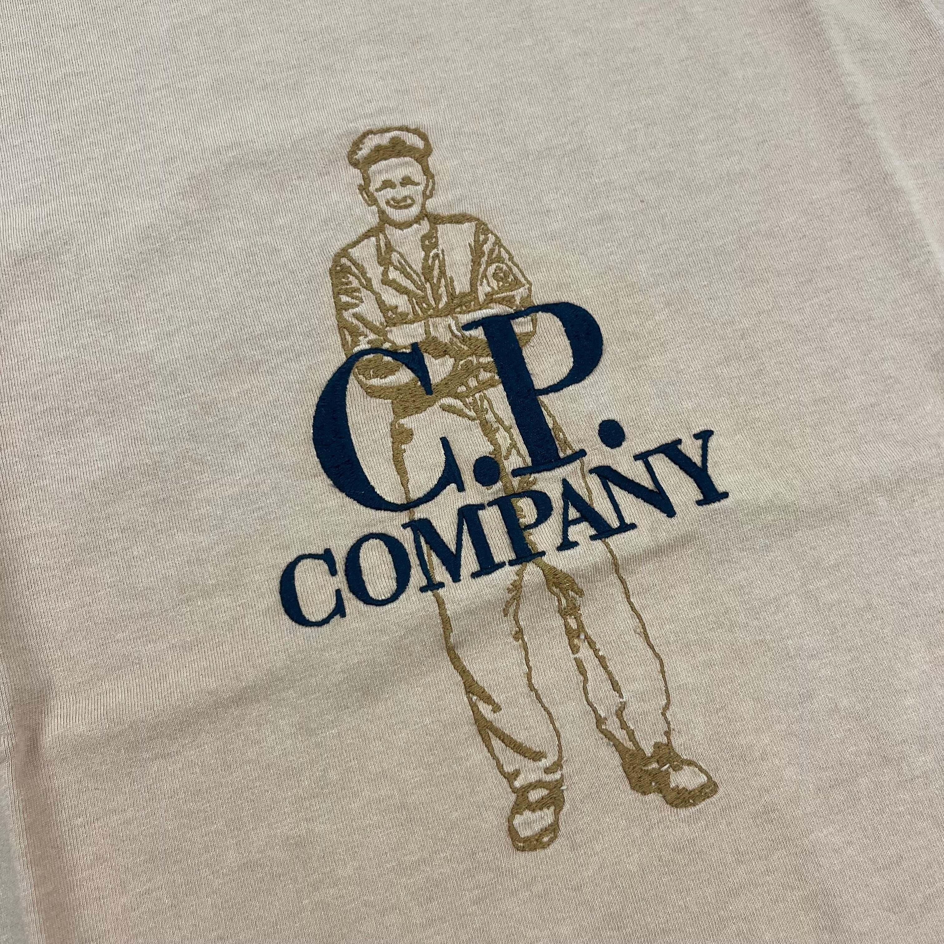CP Company 1020 Embroidered Sailor T-Shirt in Pastry Shell. On sale at Open Attire.