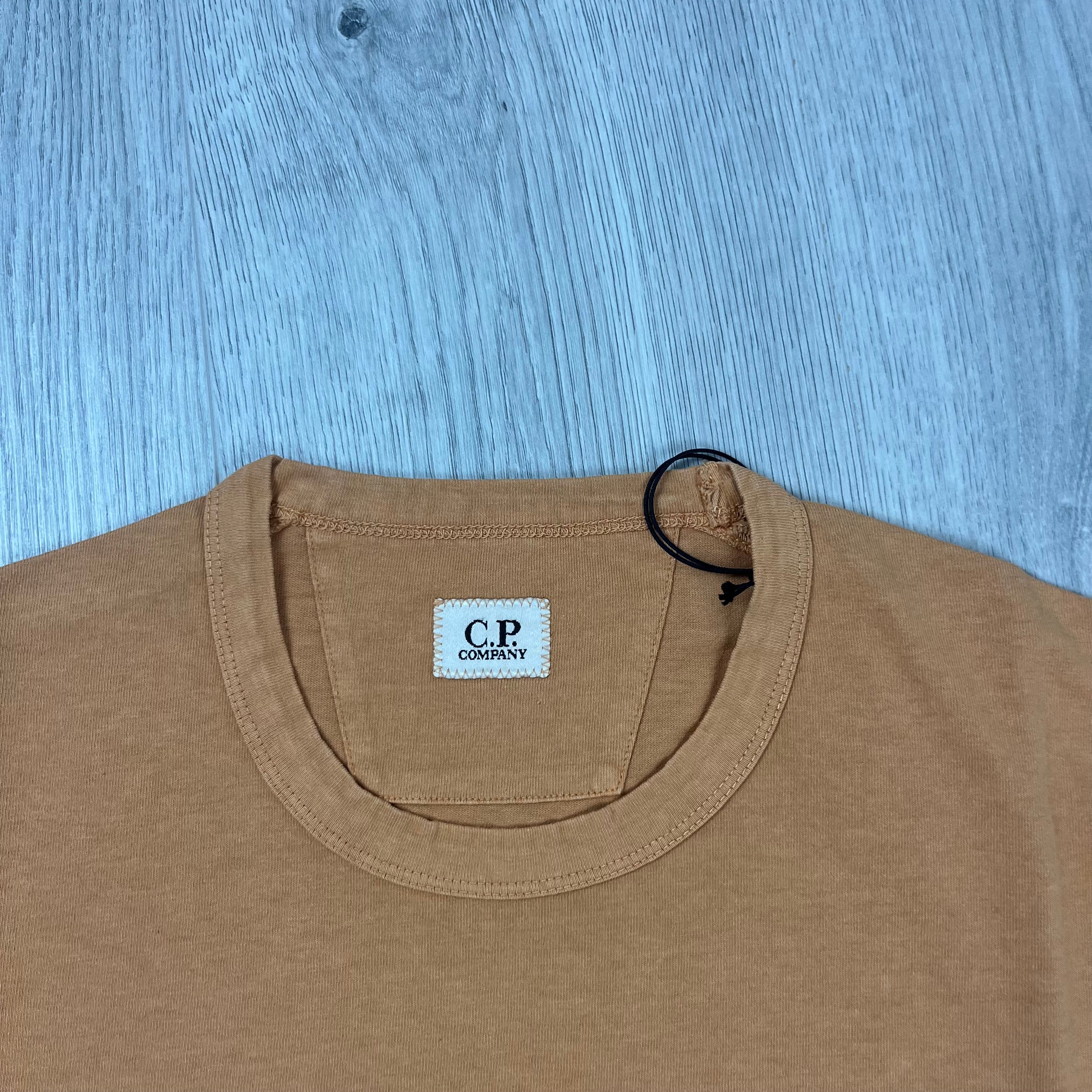 CP Company 1020 Embroidered Sailor T-Shirt in Pastry Shell. On sale at Open Attire.