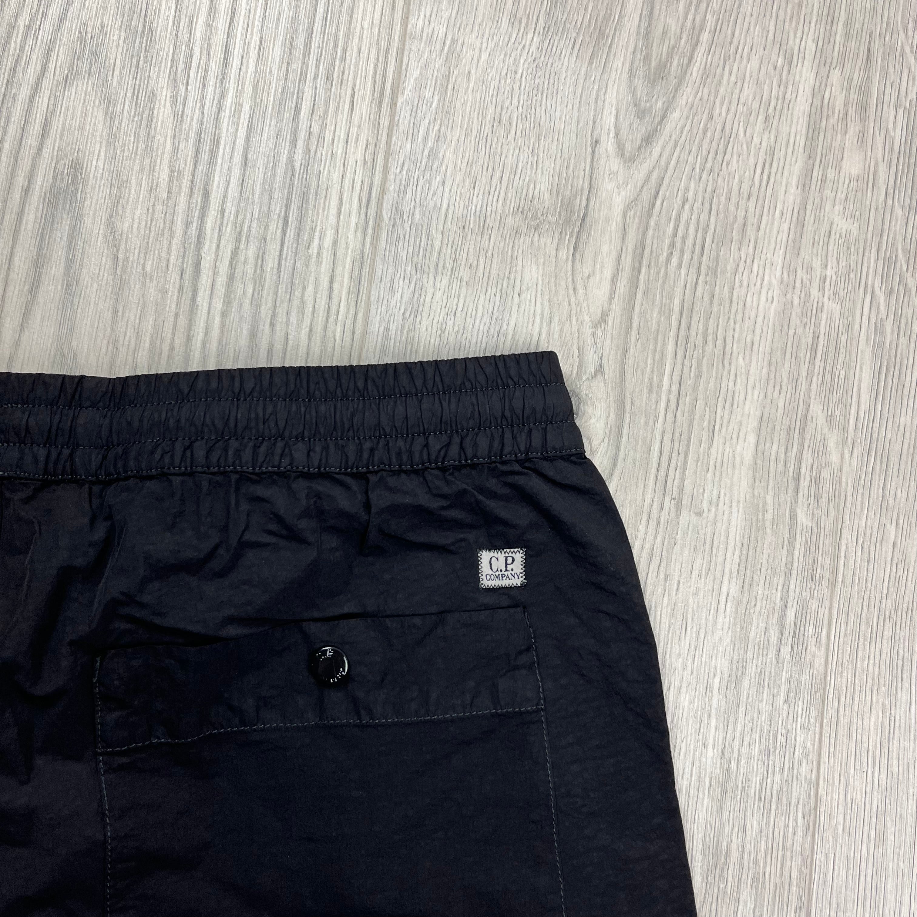 CP Company Flatt Nylon Cargo Trousers in Black. On sale at Open Attire.