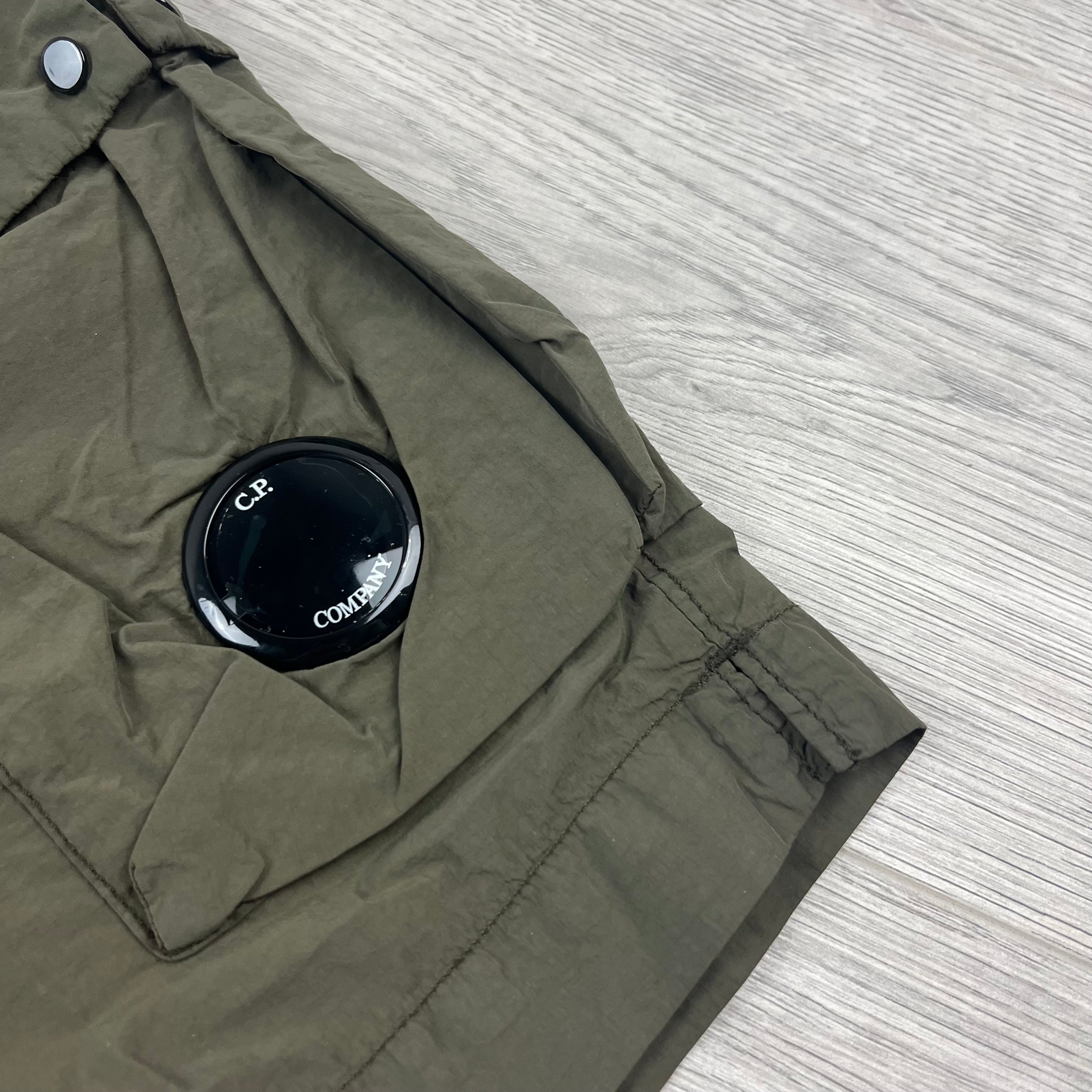 CP Company Flatt Nylon Lens Swim Shorts in Ivy Green. On sale at Open Attire.