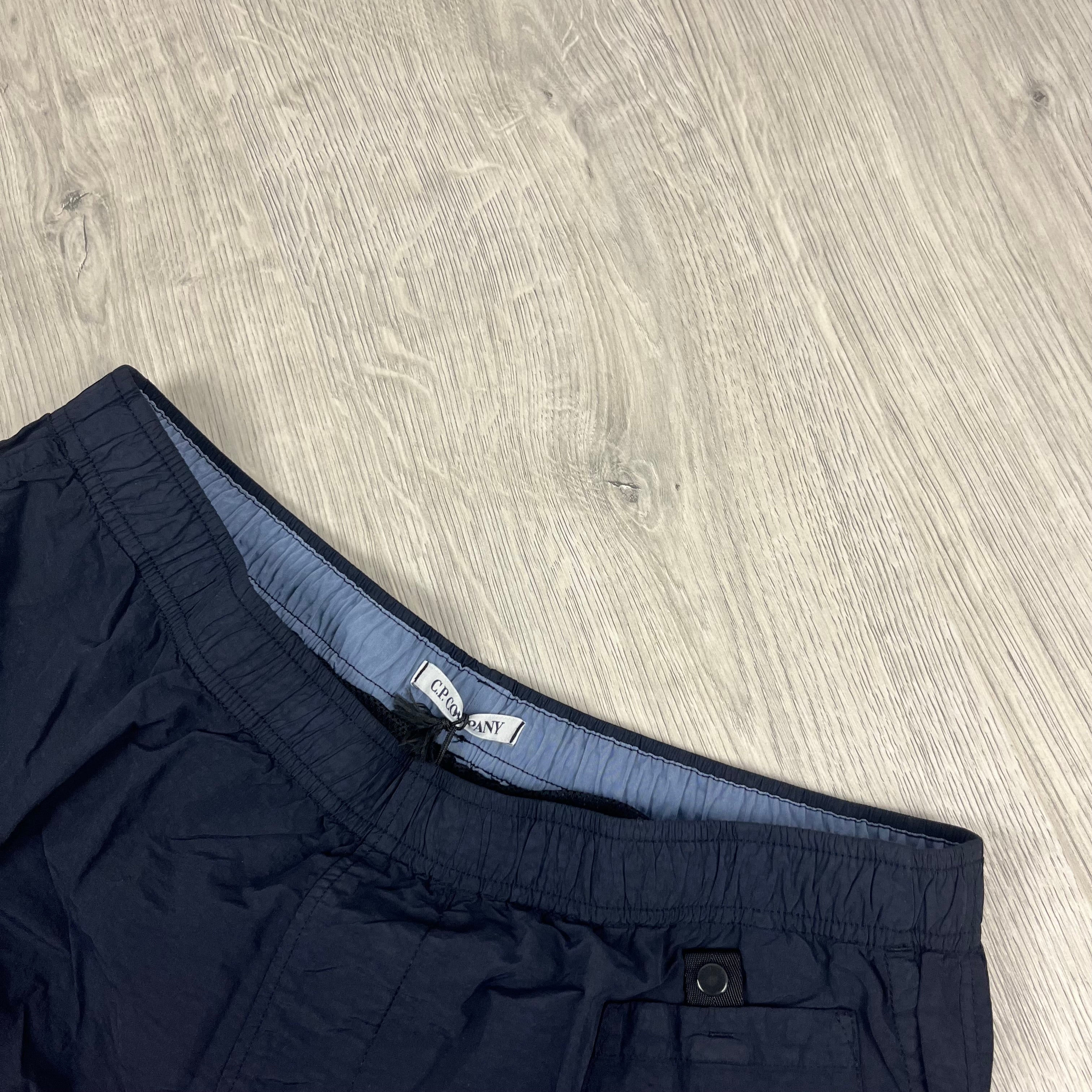 Men's CP Company Flatt Nylon Swim Shorts in Total Eclipse. On sale at Open Attire.