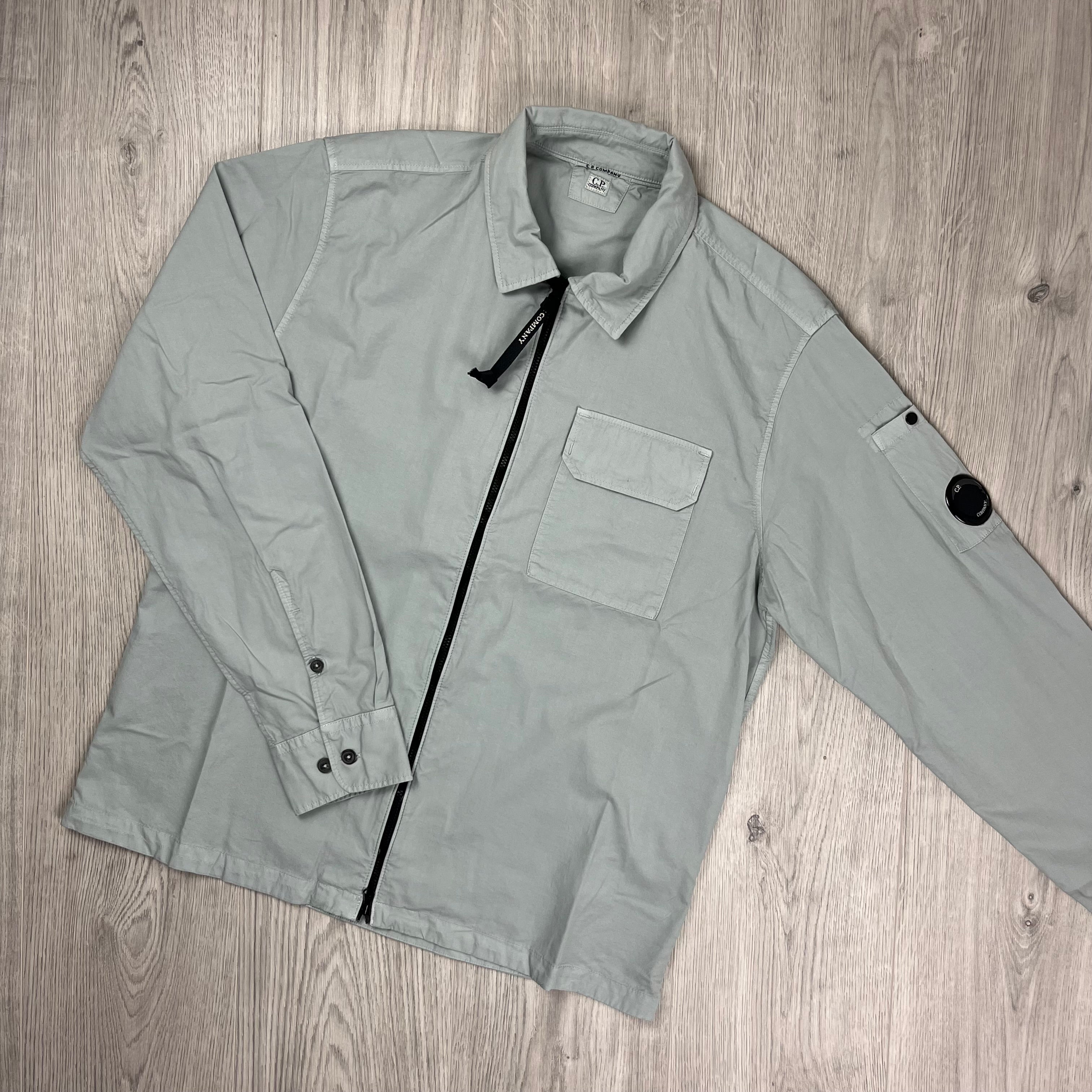 CP Company Gabardine Zip Overshirt in Blue Fox. On sale at Open Attire.