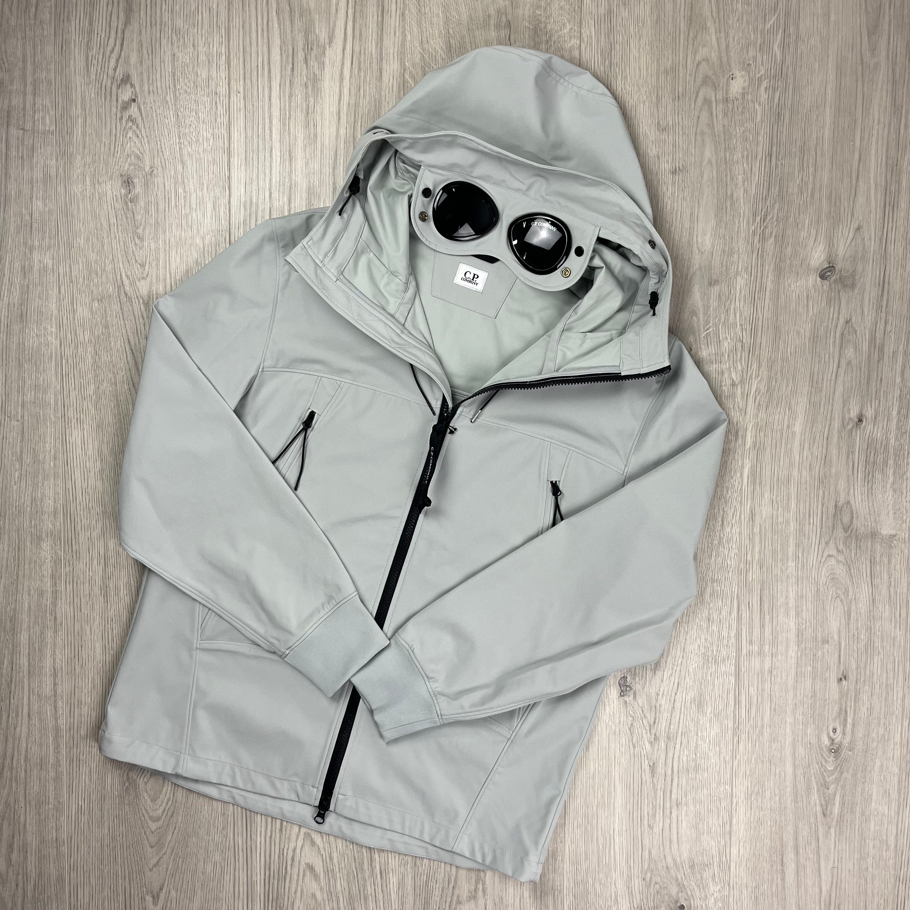 CP Company Shell-R Goggle Jacket in Blue Fox. On sale at Open Attire.