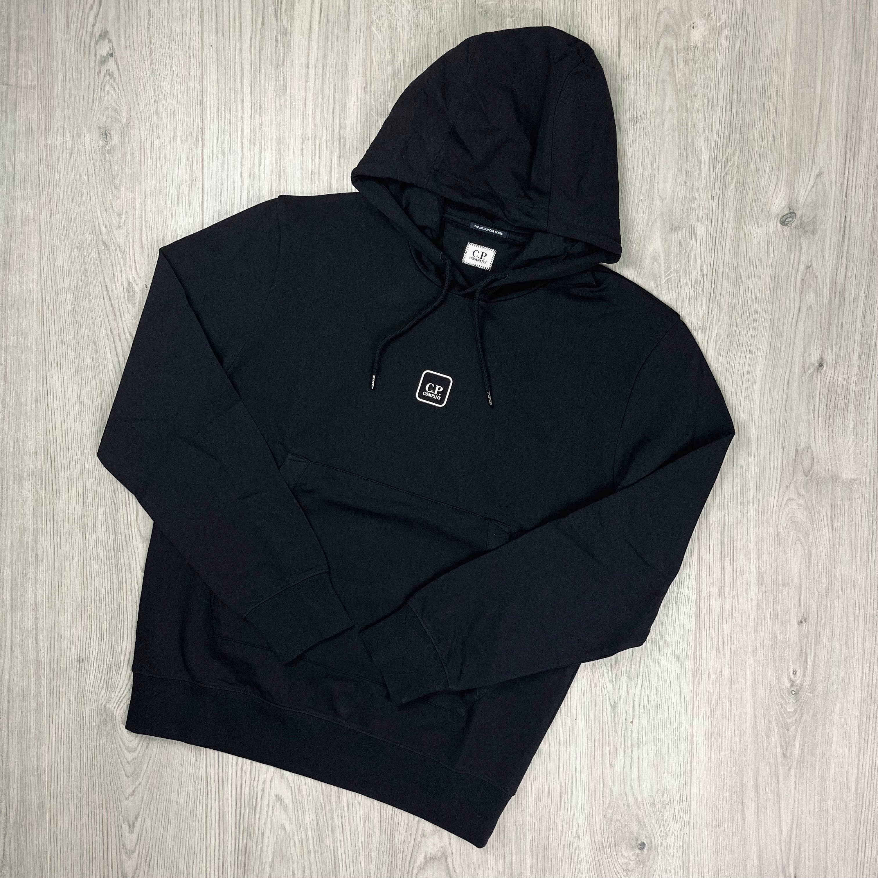 CP Company Metropolis Series Stretch Fleece Hoodie in Black. On sale at Open Attire.