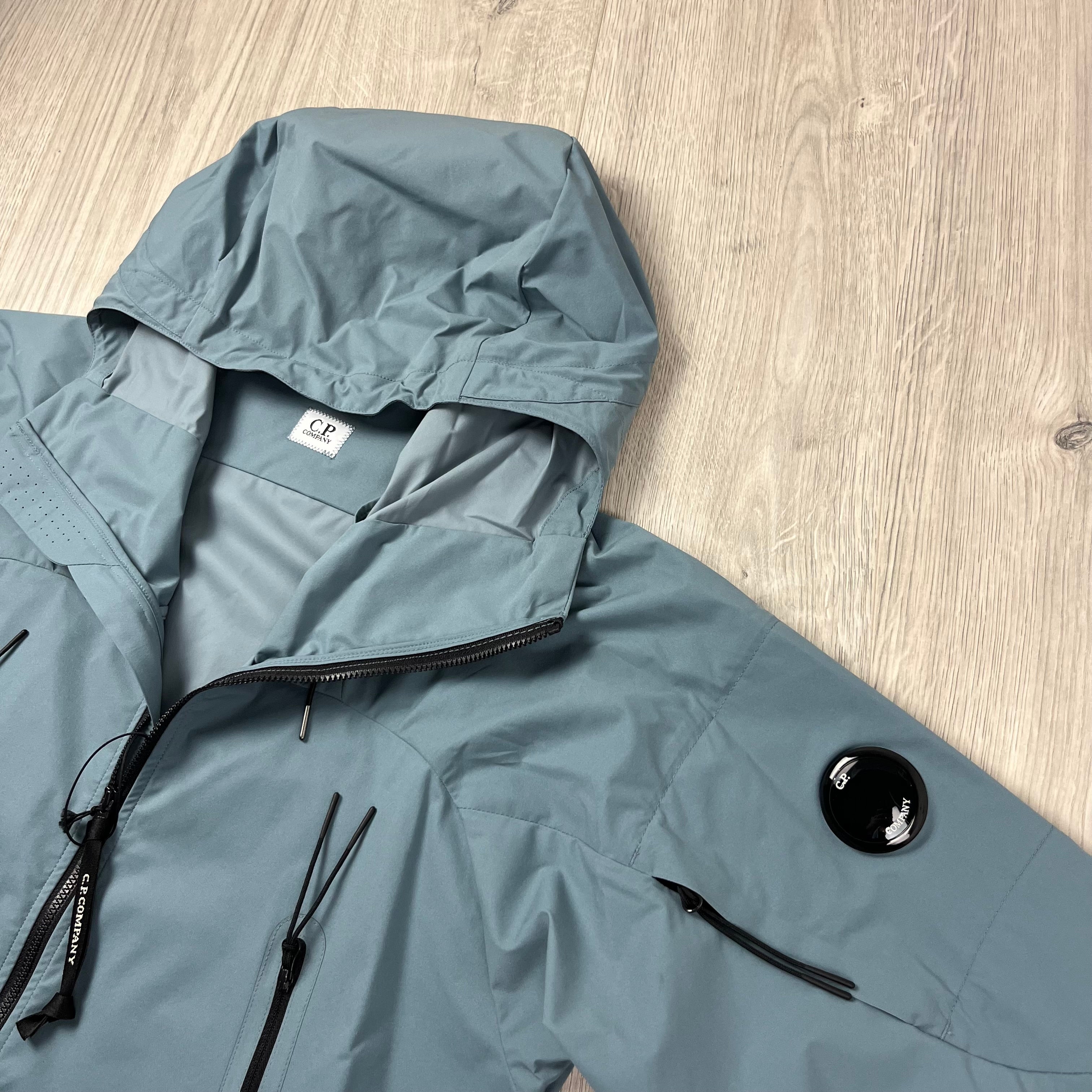 CP Company Pro-Tek Jacket in Stormy Weather Blue. On sale at Open Attire.