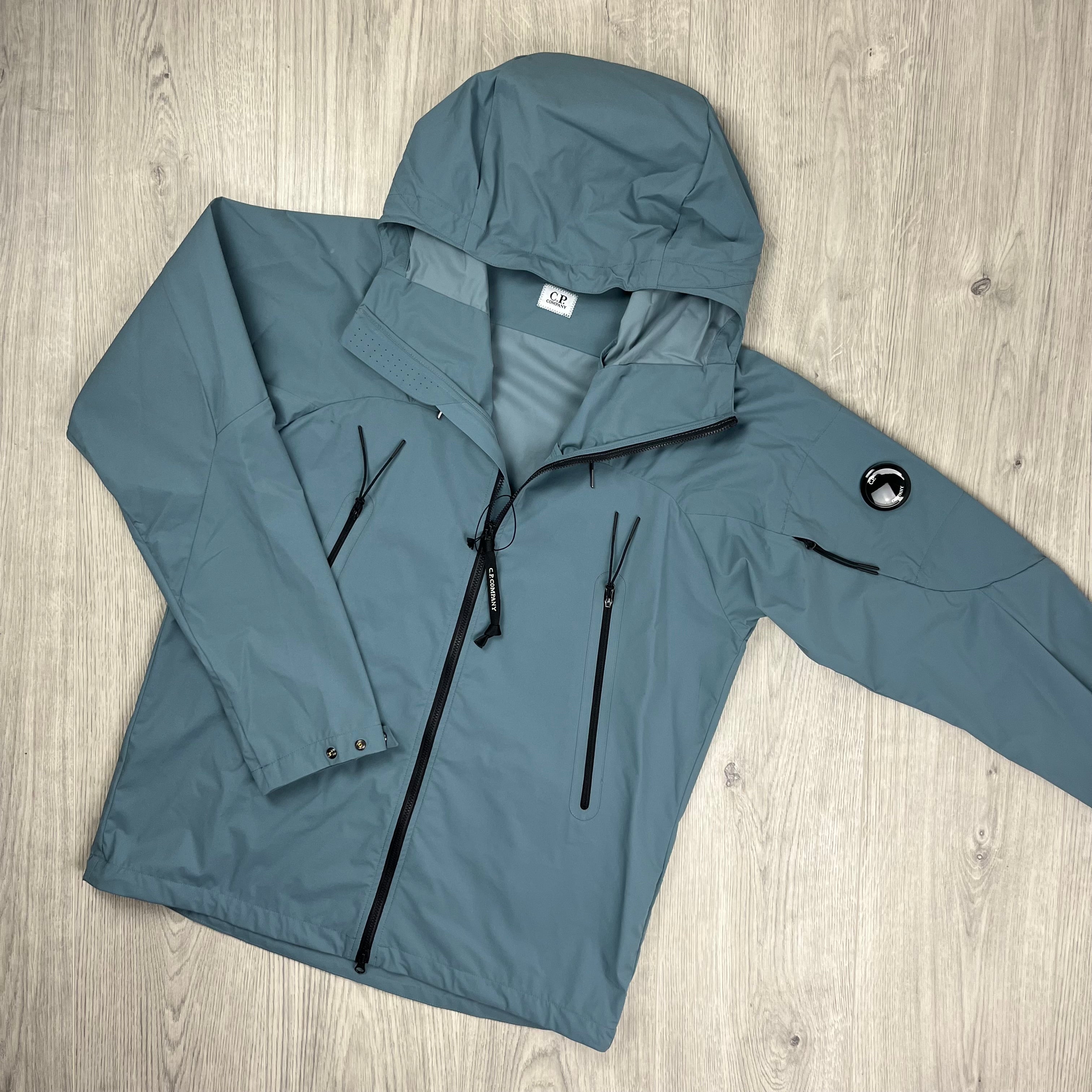 CP Company Pro-Tek Jacket in Stormy Weather Blue. On sale at Open Attire.