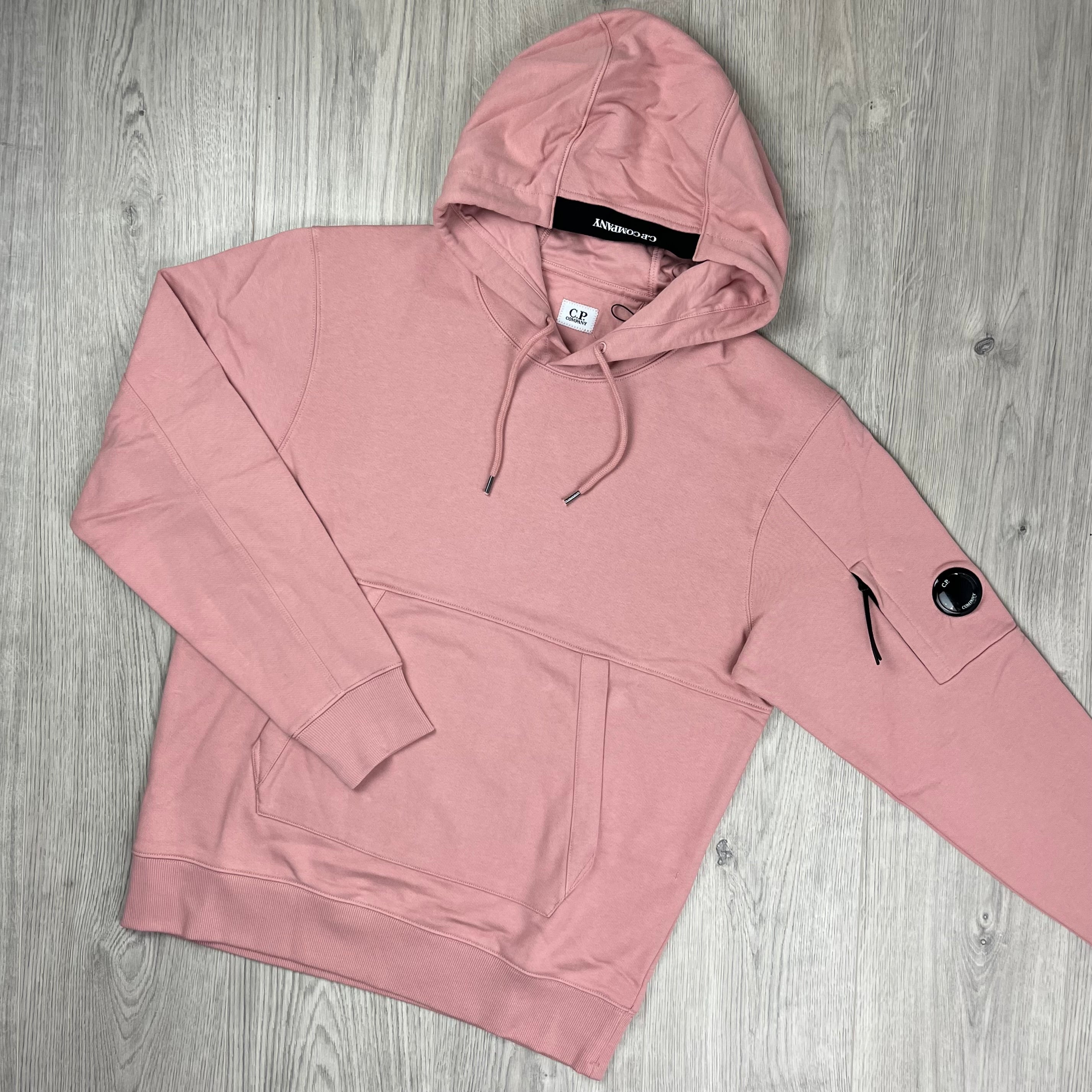 CP Company Diagonal Raised Fleece Hoodie in Misty Rose. On sale at Open Attire.