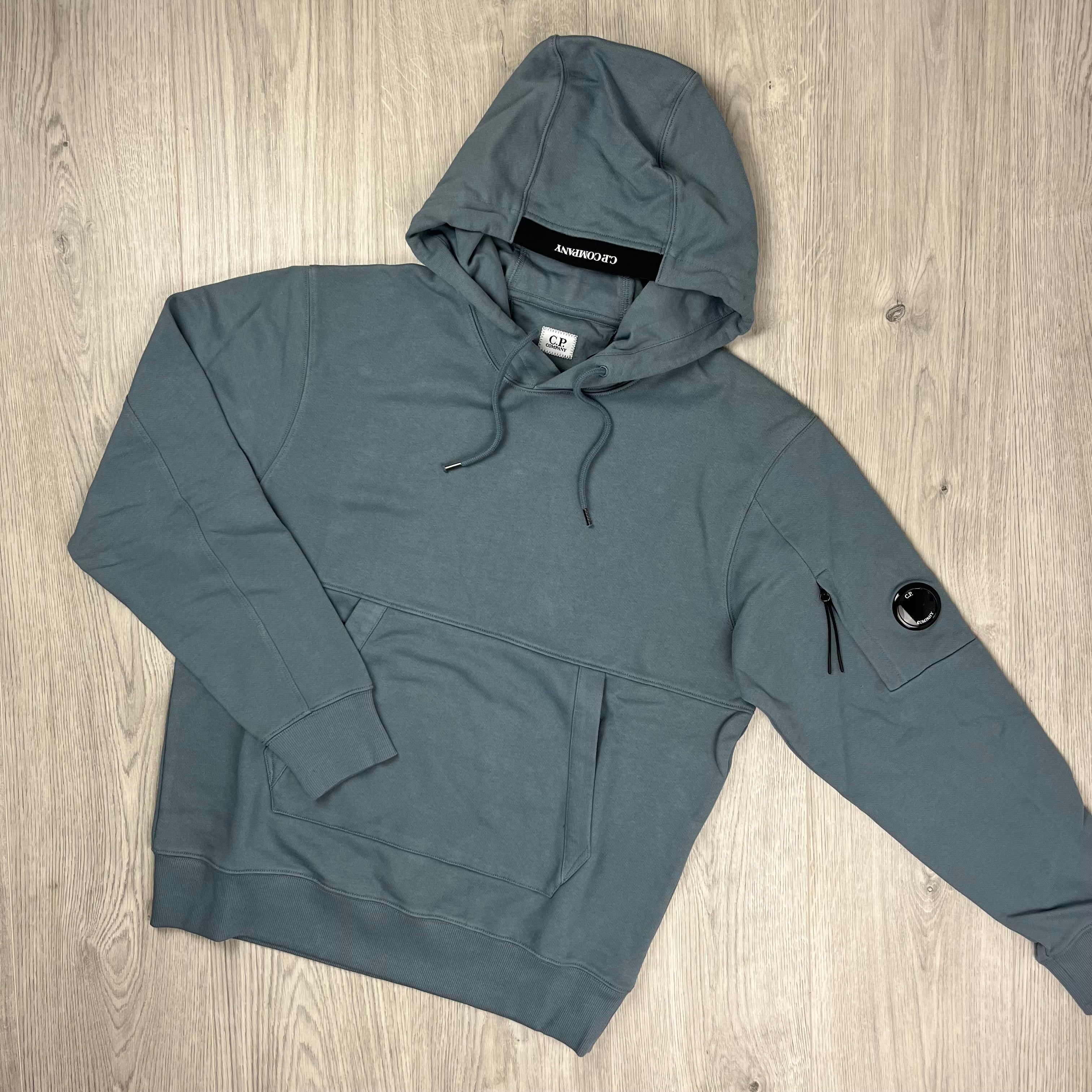 CP Company Diagonal Raised Fleece Hoodie in Stormy Weather. On sale at Open Attire.