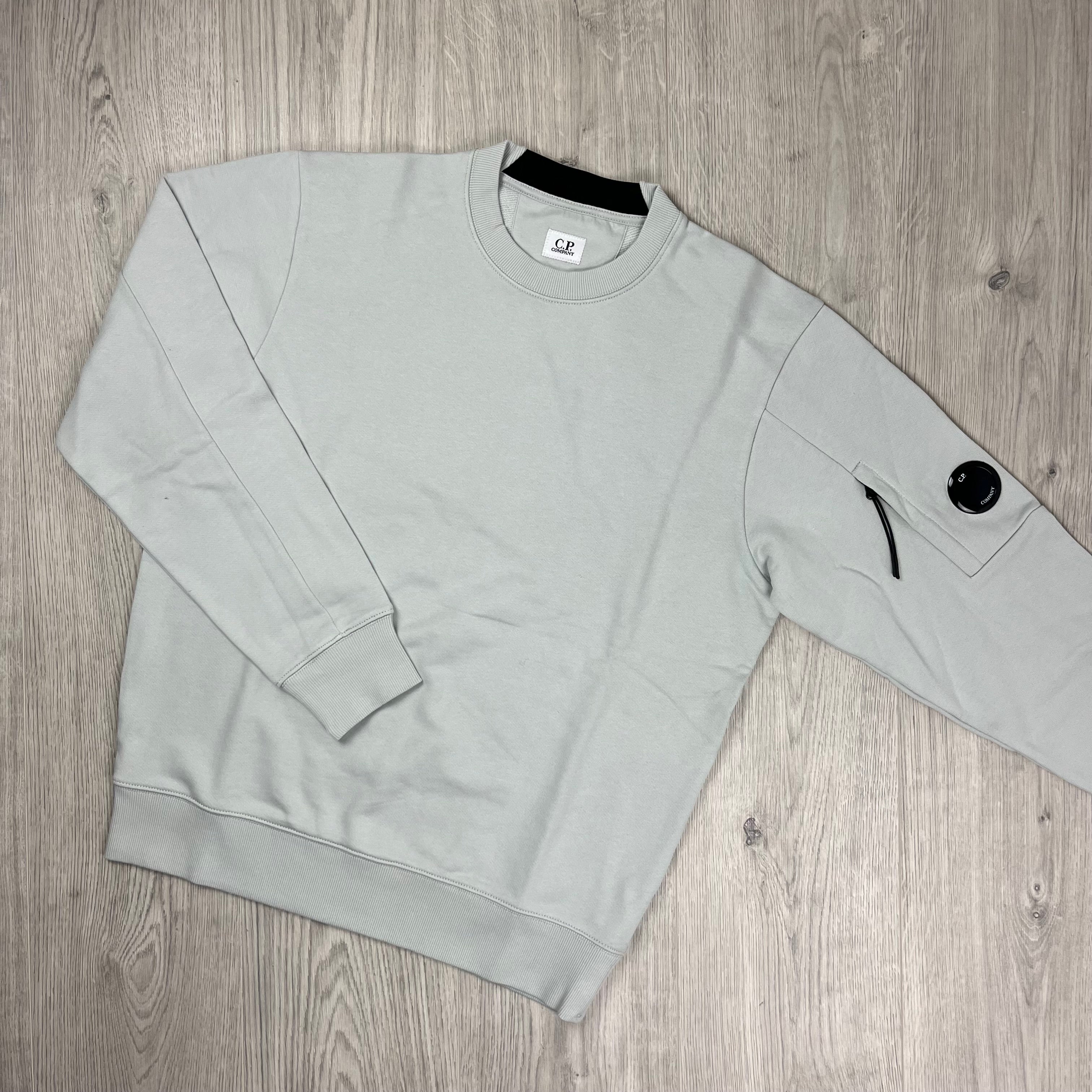 CP Company Raised Fleece Sweatshirt in Blue Fox. On sale at Open Attire.