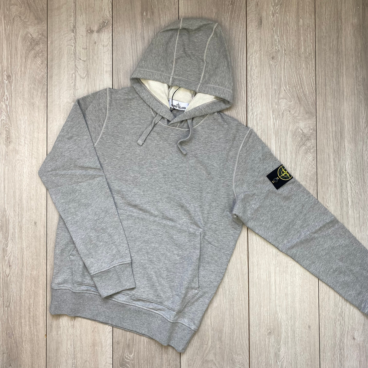 Stone Island Tracksuit in Dust Grey Melange. On sale at Open Attire.