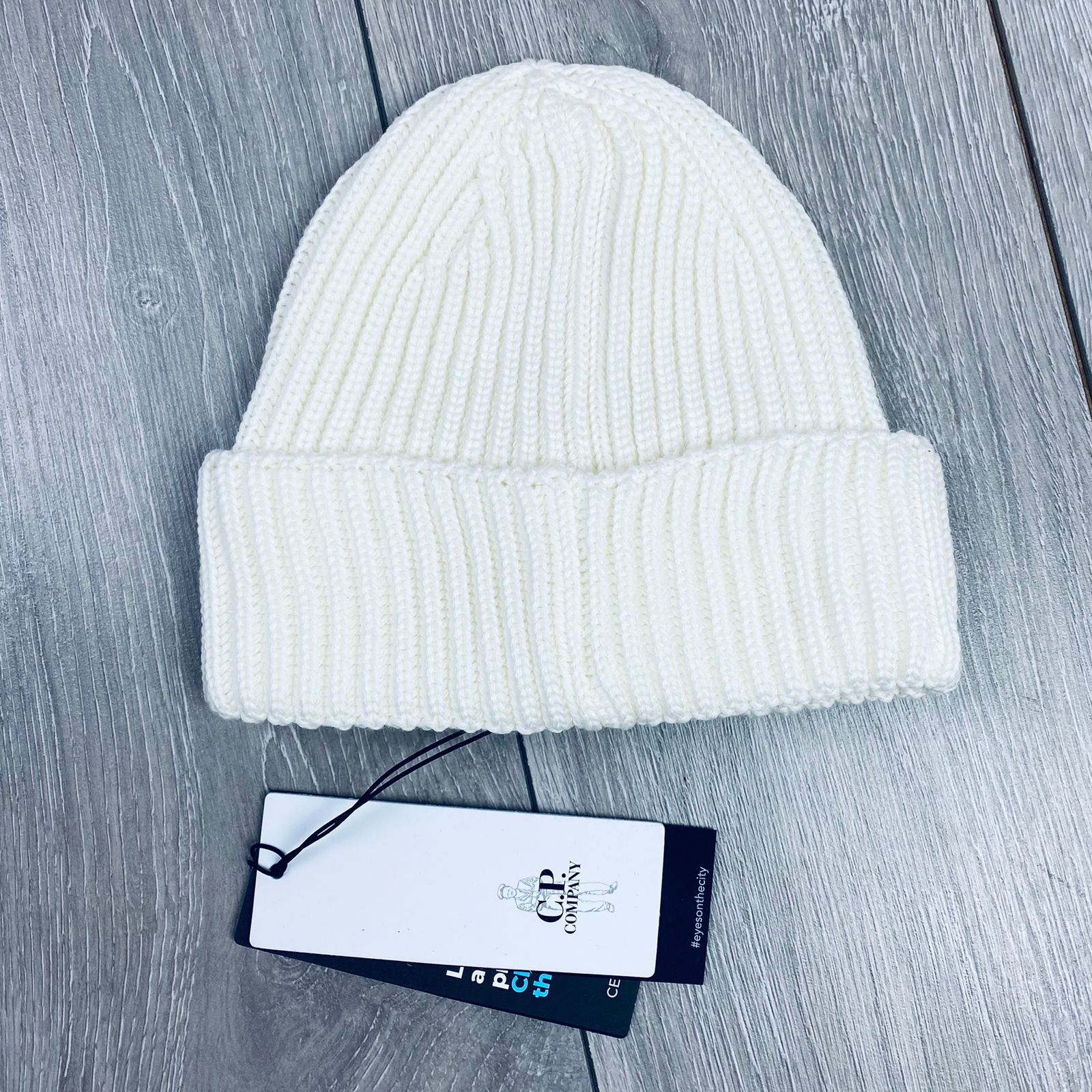 CP Company Extra Fine Merino Wool Goggle Beanie in Gauze White. On sale at Open Attire.