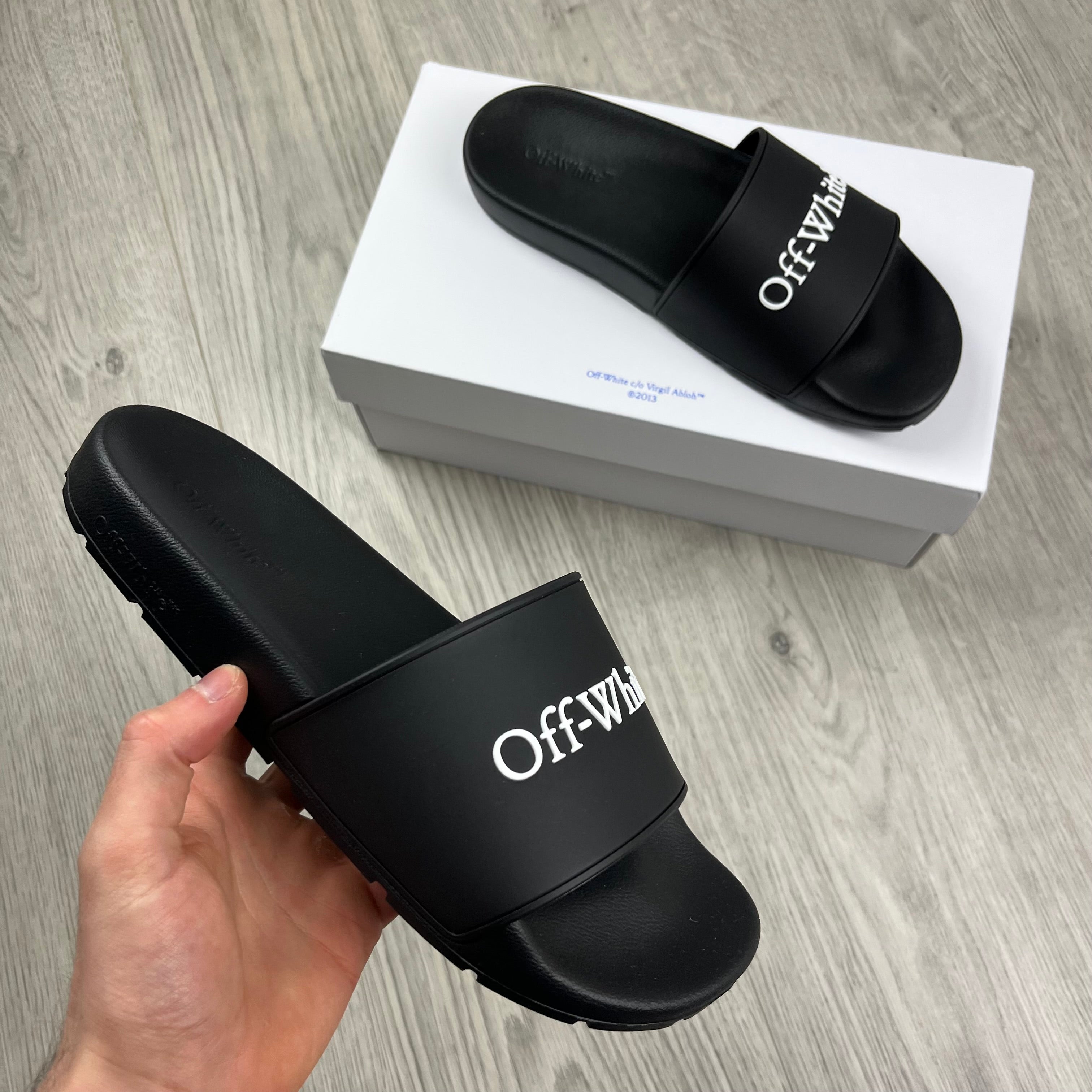 Off-White c/o Virgil Abloh Bookish Slides in Black. On sale at Open Attire.