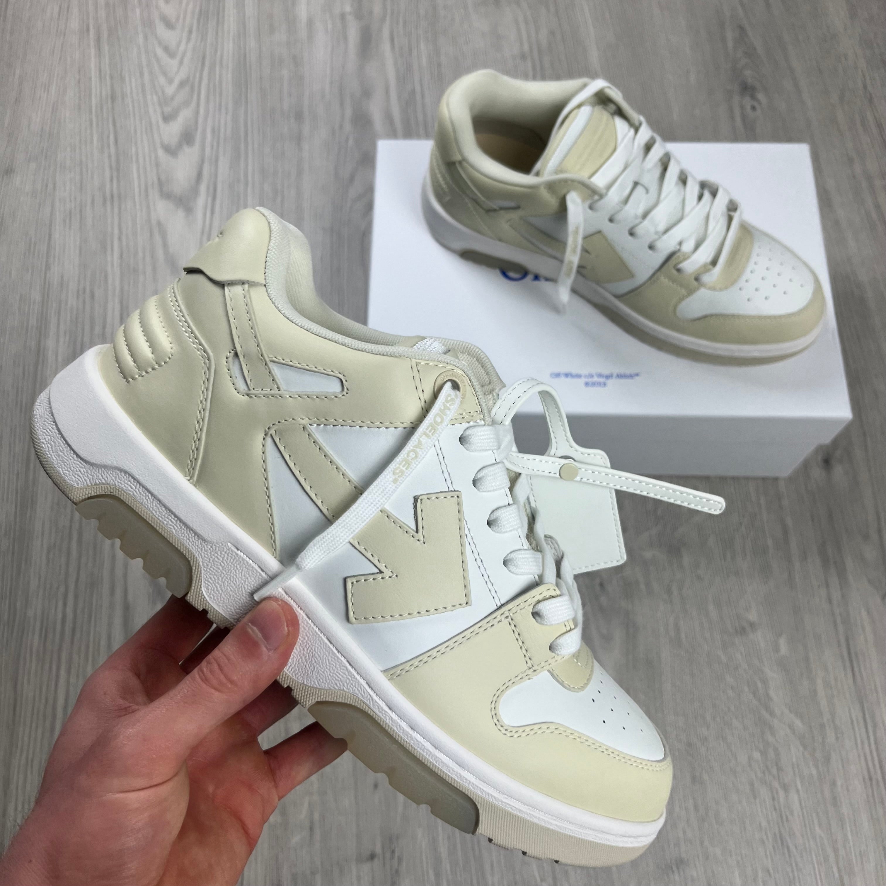 Off-White c/o Virgil Abloh 'Out of Office' Sneakers in Cream. On sale at Open Attire.